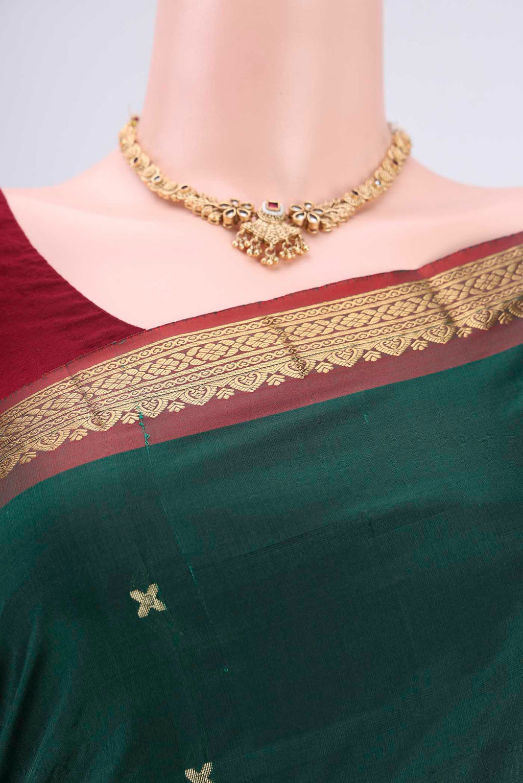Border image of Bottle Green Blended Bangalore Silk Saree with Zari Butta on the body and Zari Border. 