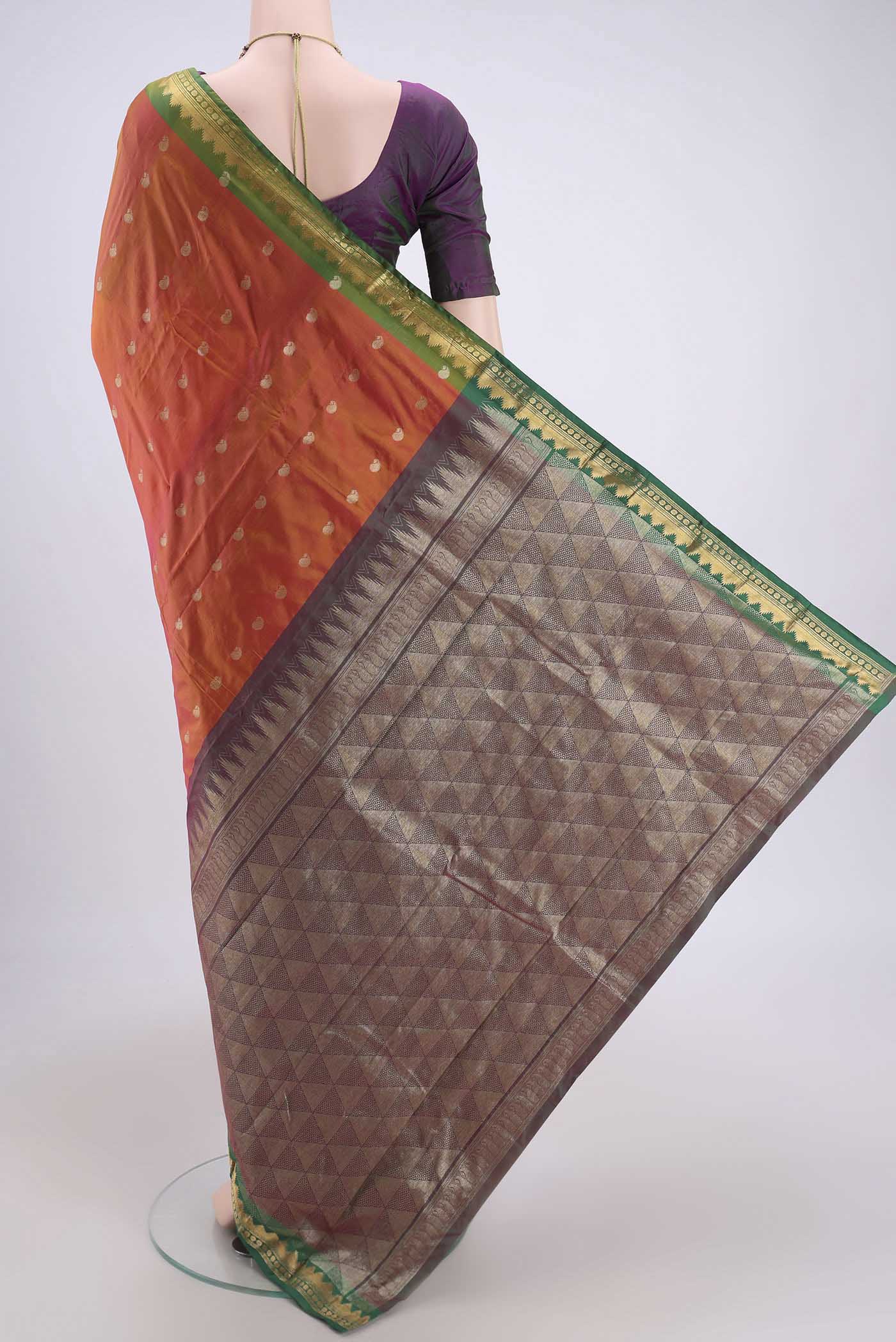 Flat view of Brick Orange Blended Bangalore Silk Saree with Zari Butta on the body and Zari Border. 