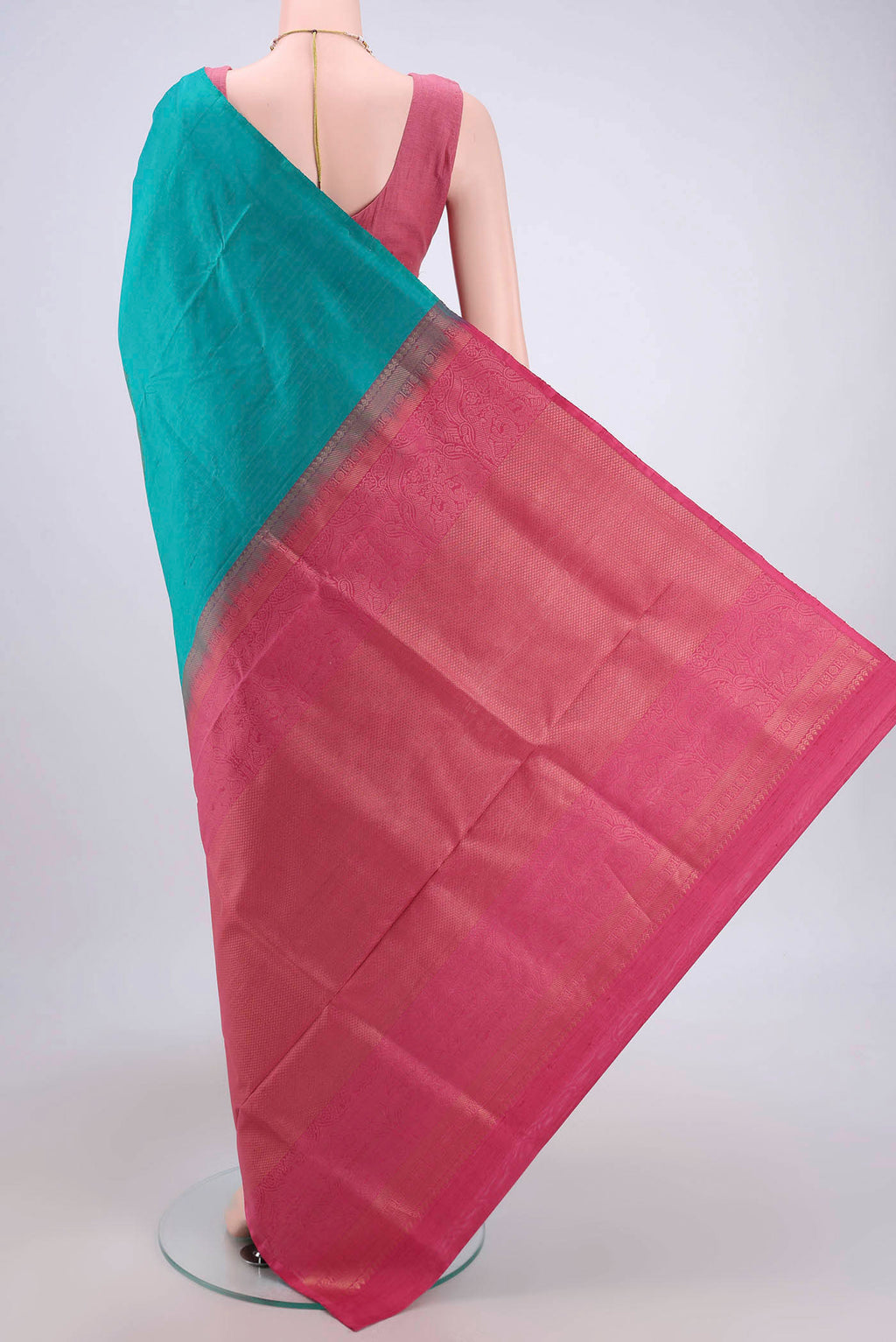 Flat view of Blue Soft Silk Saree with Zari Butta on the body and Zari Border. 