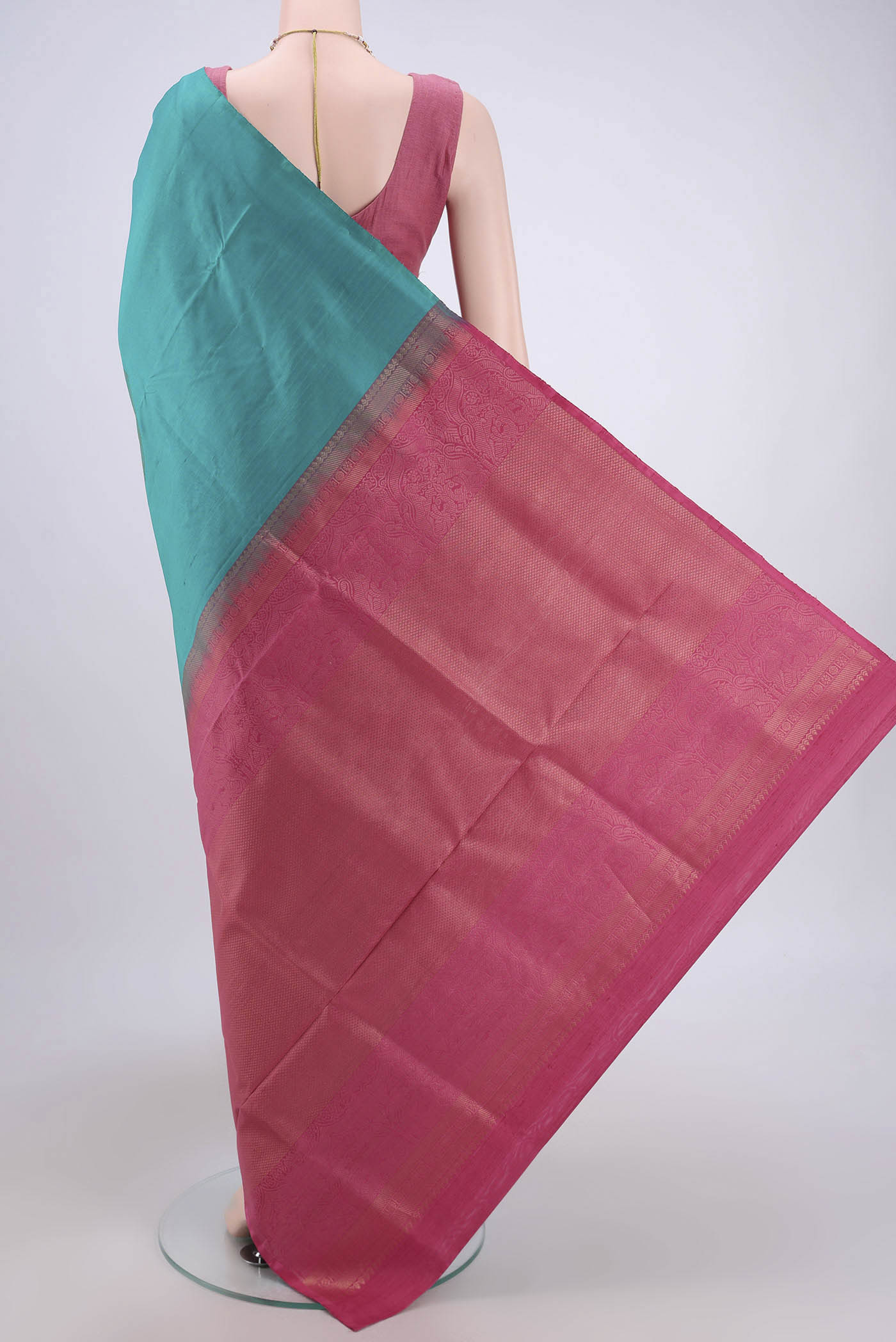 Flat view of Blue Soft Silk Saree with Zari Butta on the body and Zari Border. 