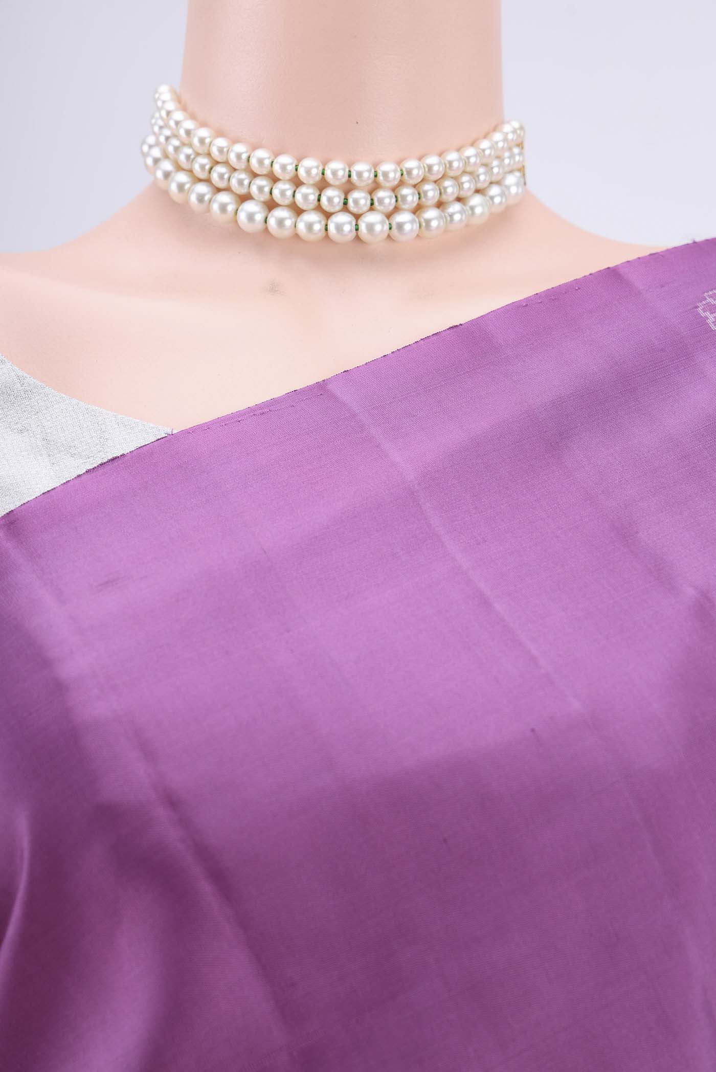 Border image of Mauve Soft Silk Saree with Zari Butta on the body and Zari Border. 