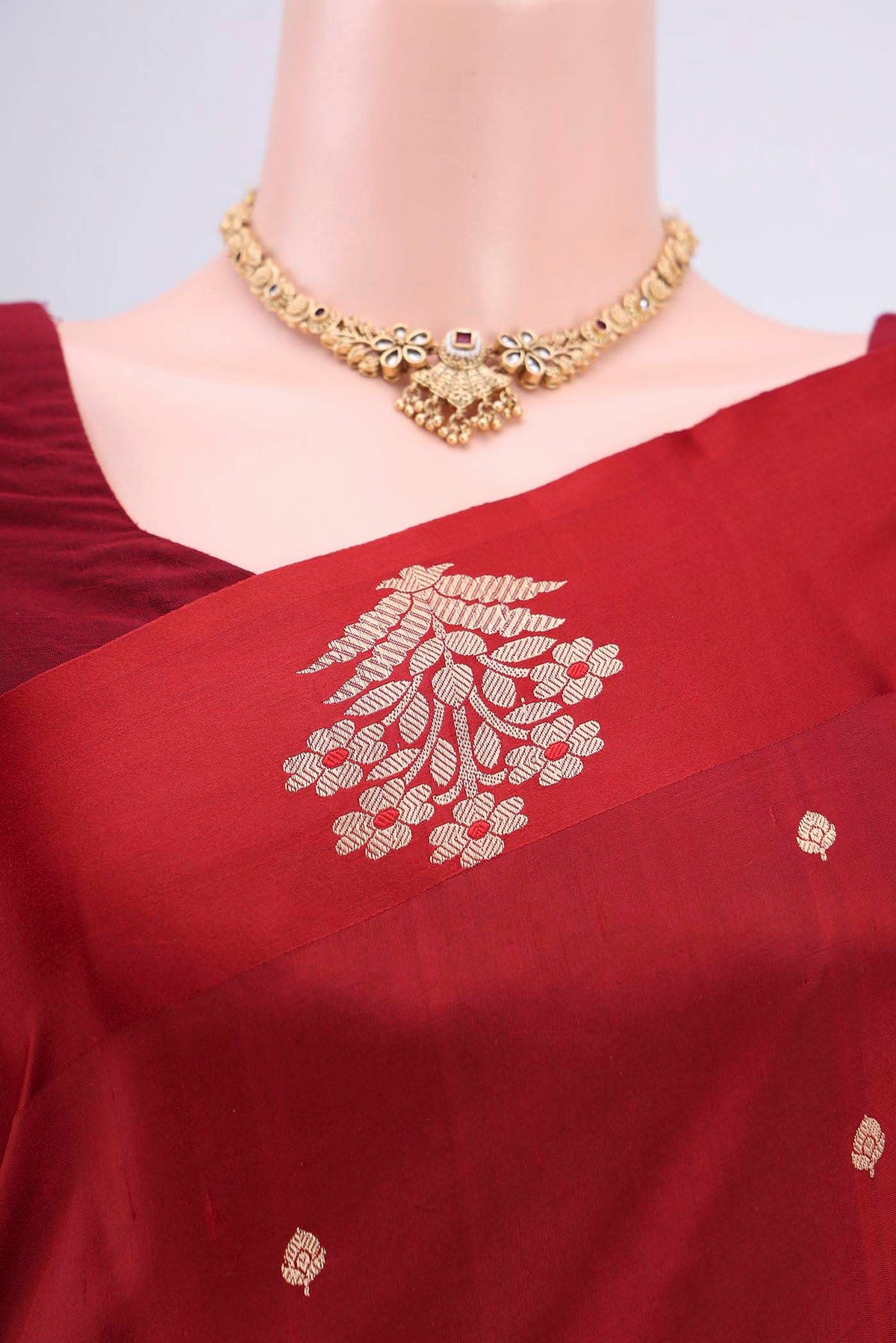 Border image of Maroon Banarasi Katan Silk Saree with Zari Butta on the body and Zari Border. 
