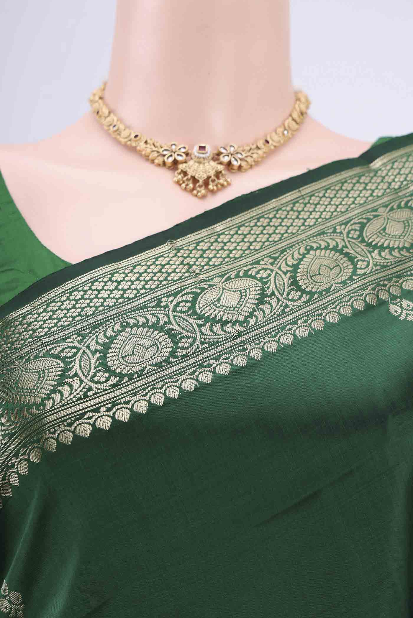 Border image of Bottle Green Banarasi Katan Silk Saree with Zari Butta on the body and Zari Border. 