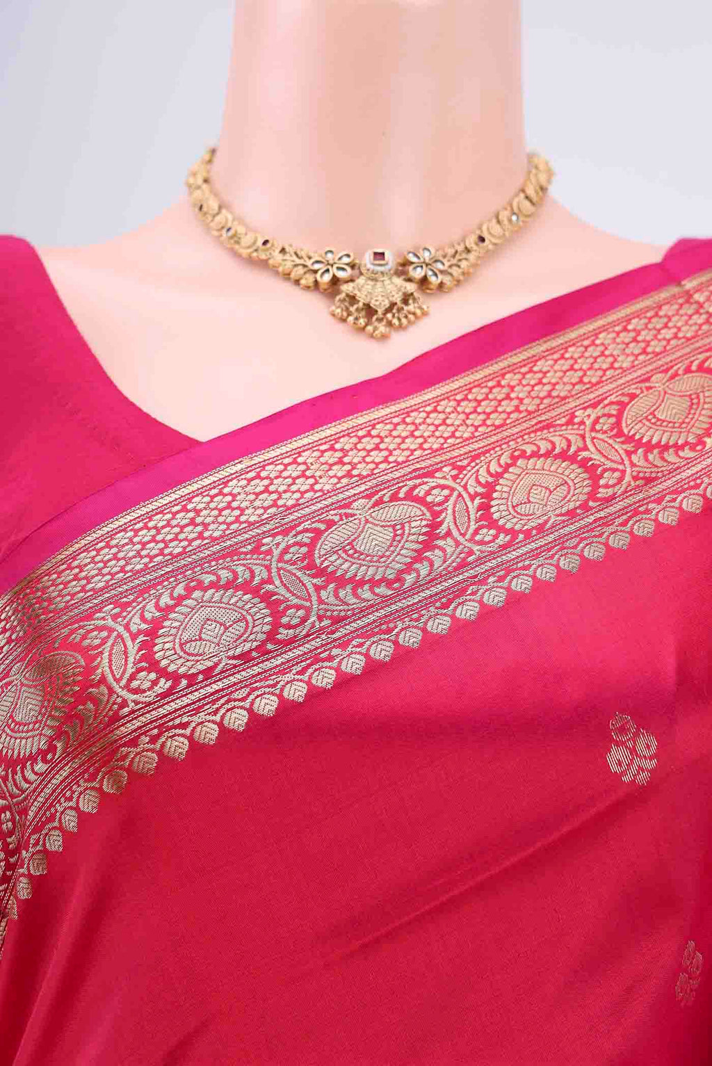Border image of Dark Pink Banarasi Katan Silk Saree with Zari Butta on the body and Zari Border. 