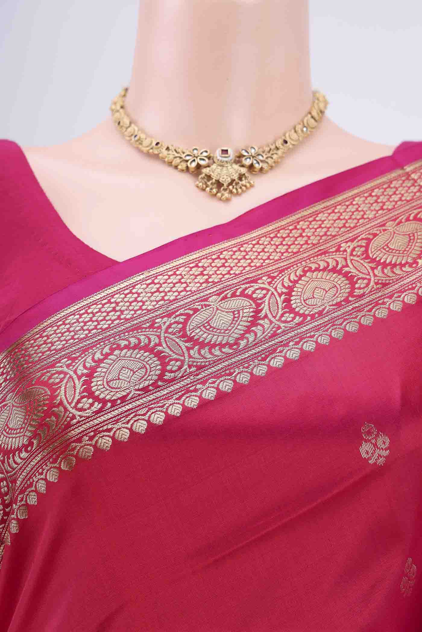 Border image of Dark Pink Banarasi Katan Silk Saree with Zari Butta on the body and Zari Border. 