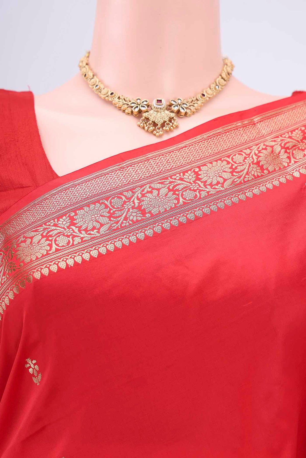 Border image of Imperial Red Banarasi Katan Silk Saree with Zari Butta on the body and Zari Border. 
