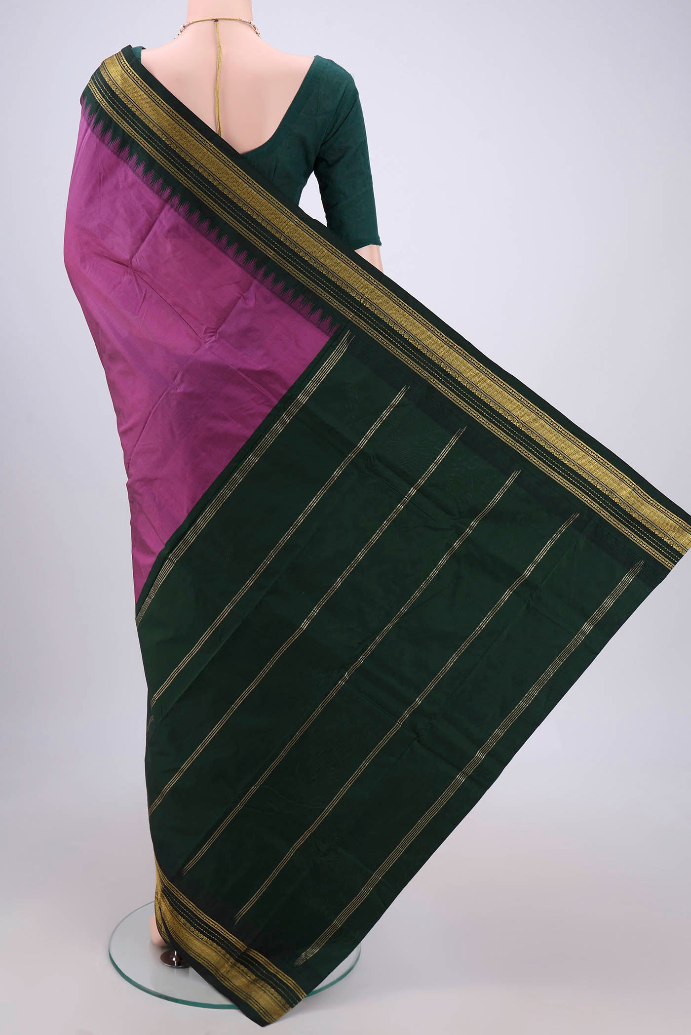 Flat view of Light Magenta Blended Bangalore Silk Saree with Plain Body and Temple Border. 