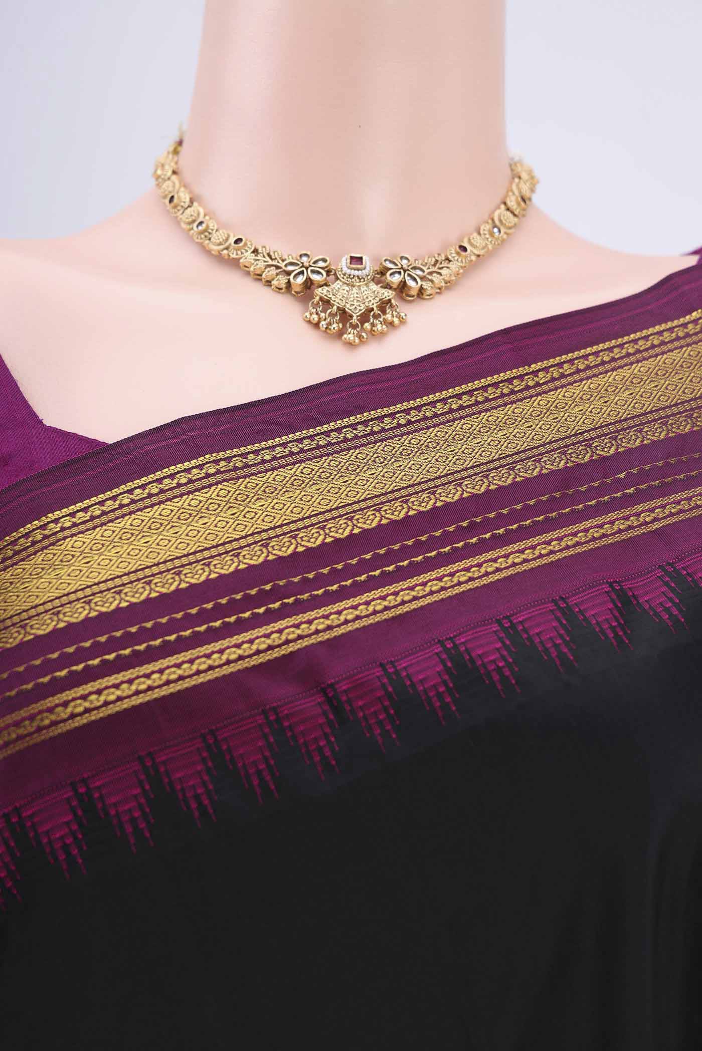 Border image of Black Bangalore Silk Saree with Plain Body and Zari Border. 