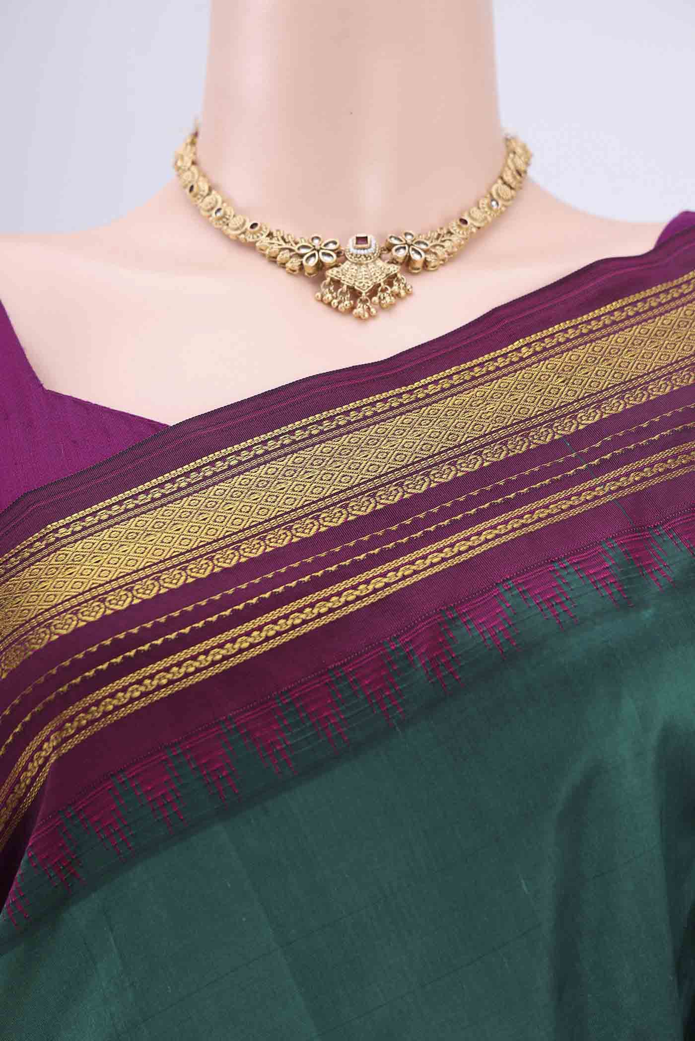 Border image of Bottle Green Bangalore Silk Saree with Plain Body and Zari Border. 