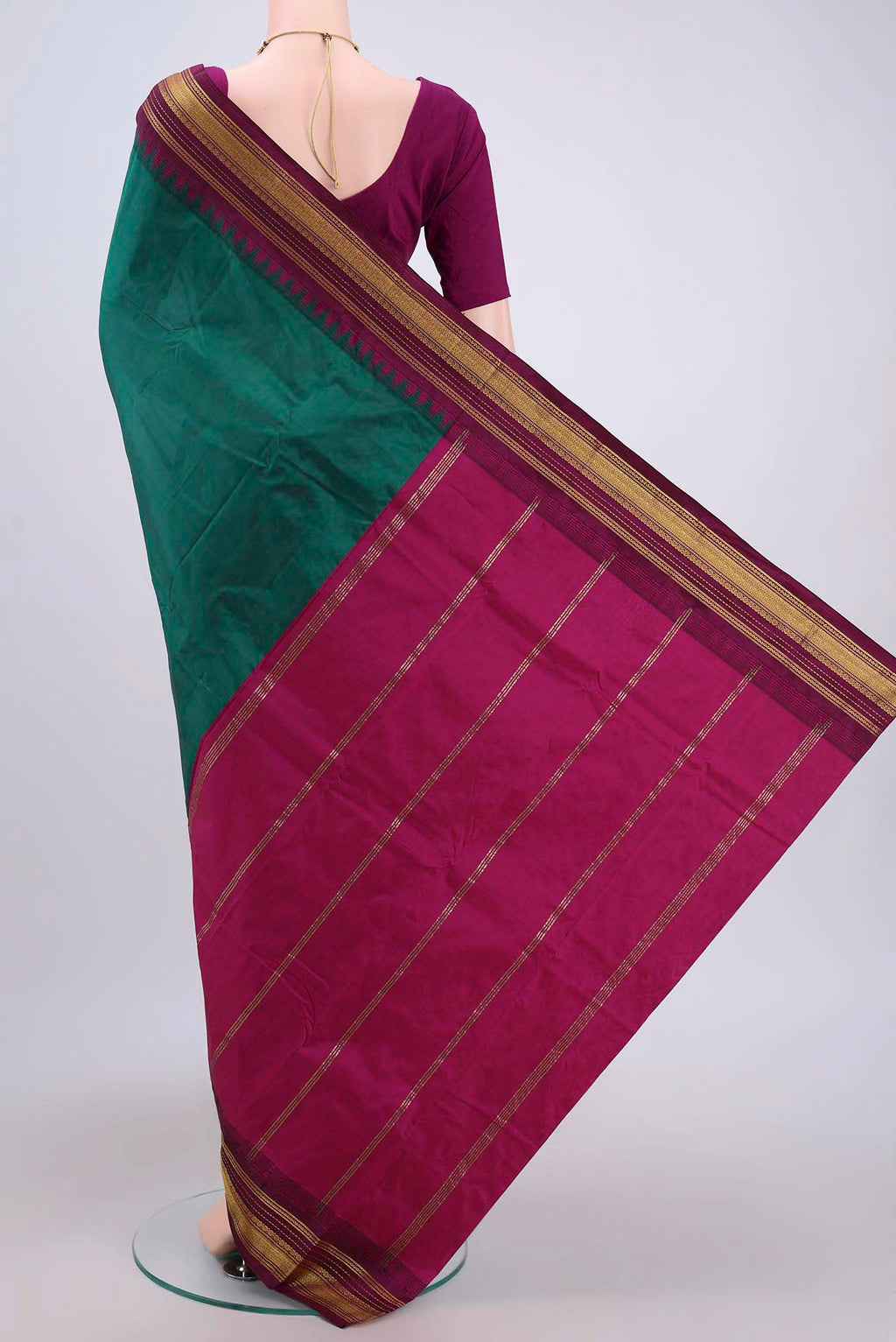 Flat view of Bottle Green Bangalore Silk Saree with Plain Body and Zari Border. 
