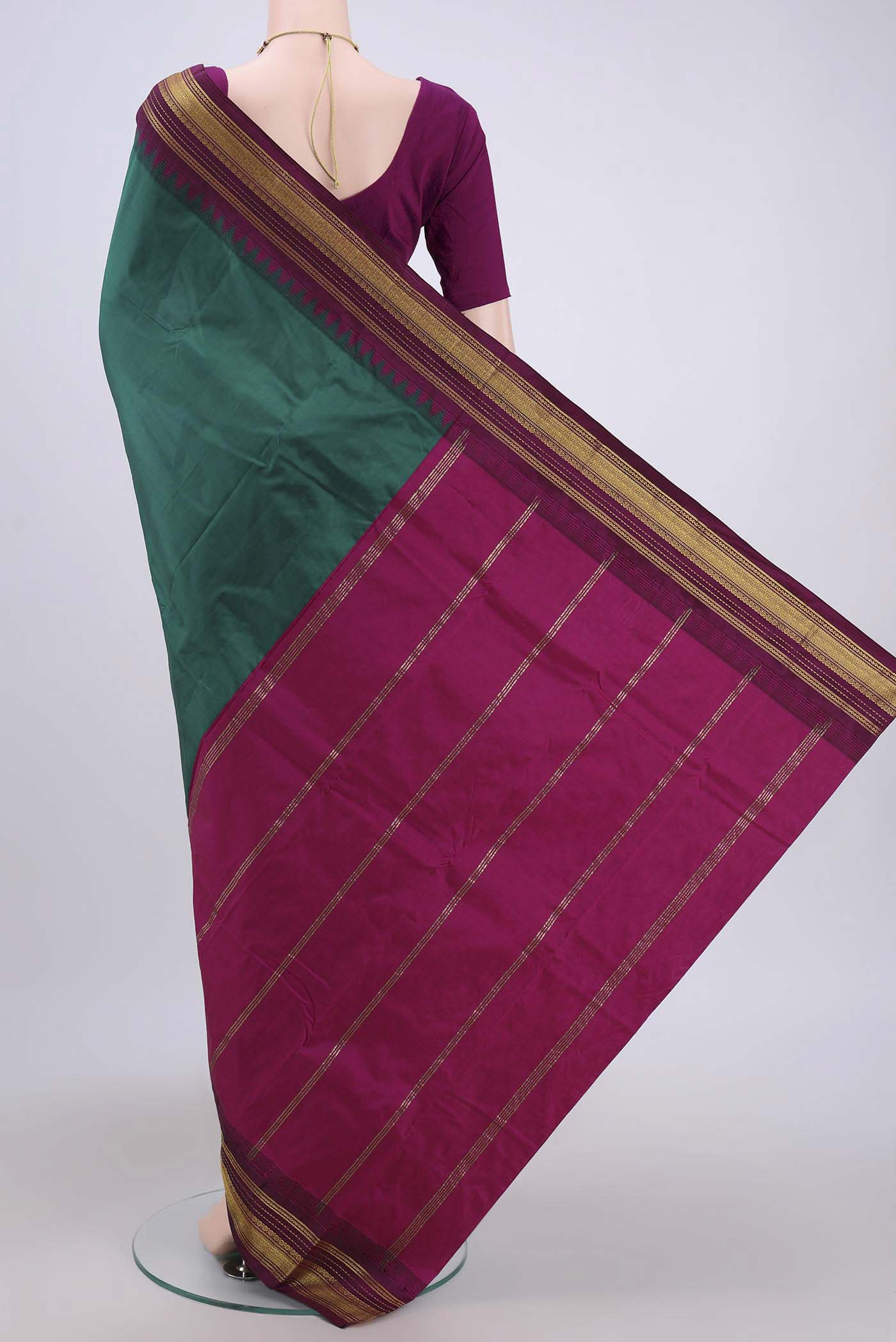 Flat view of Bottle Green Bangalore Silk Saree with Plain Body and Zari Border. 