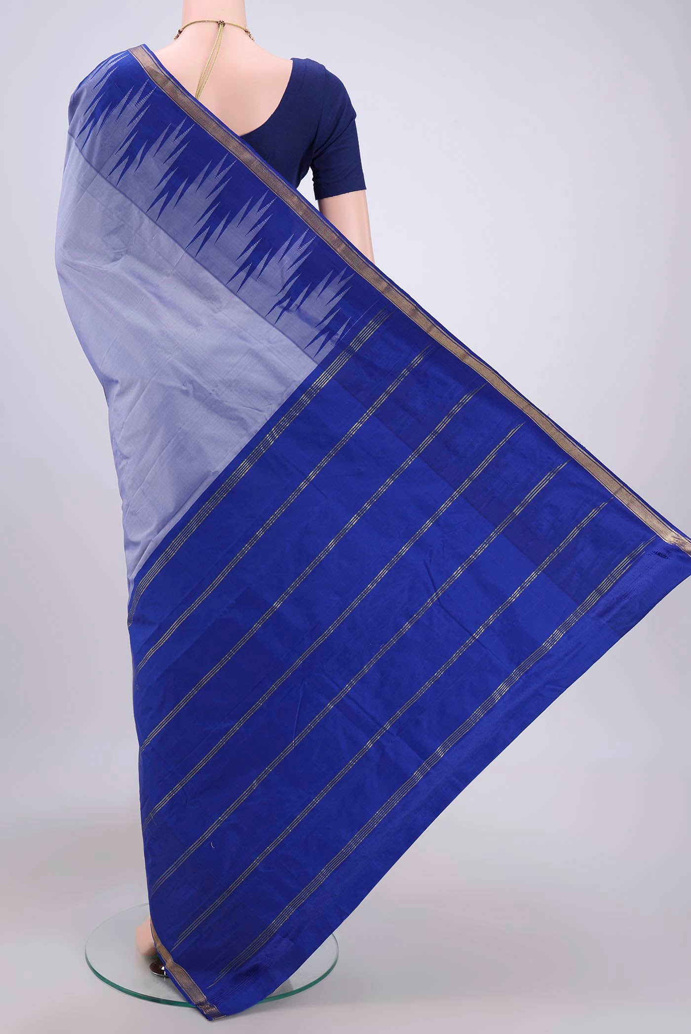 Flat view of Sky Blue Bangalore Silk Saree with Plain Body and Temple Border. 