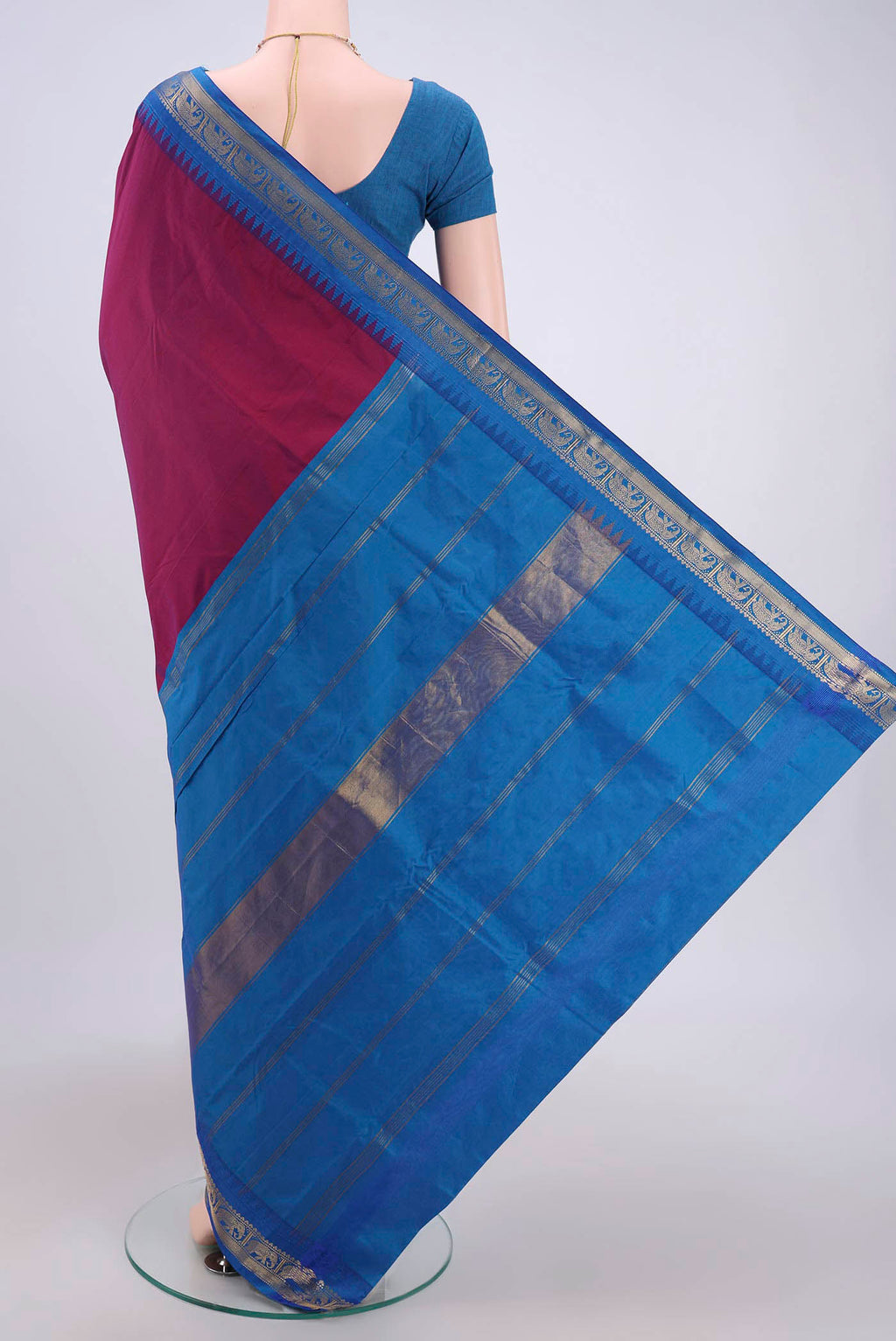 Flat view of Magenta Bangalore Silk Saree with Plain Body and Zari Border. 