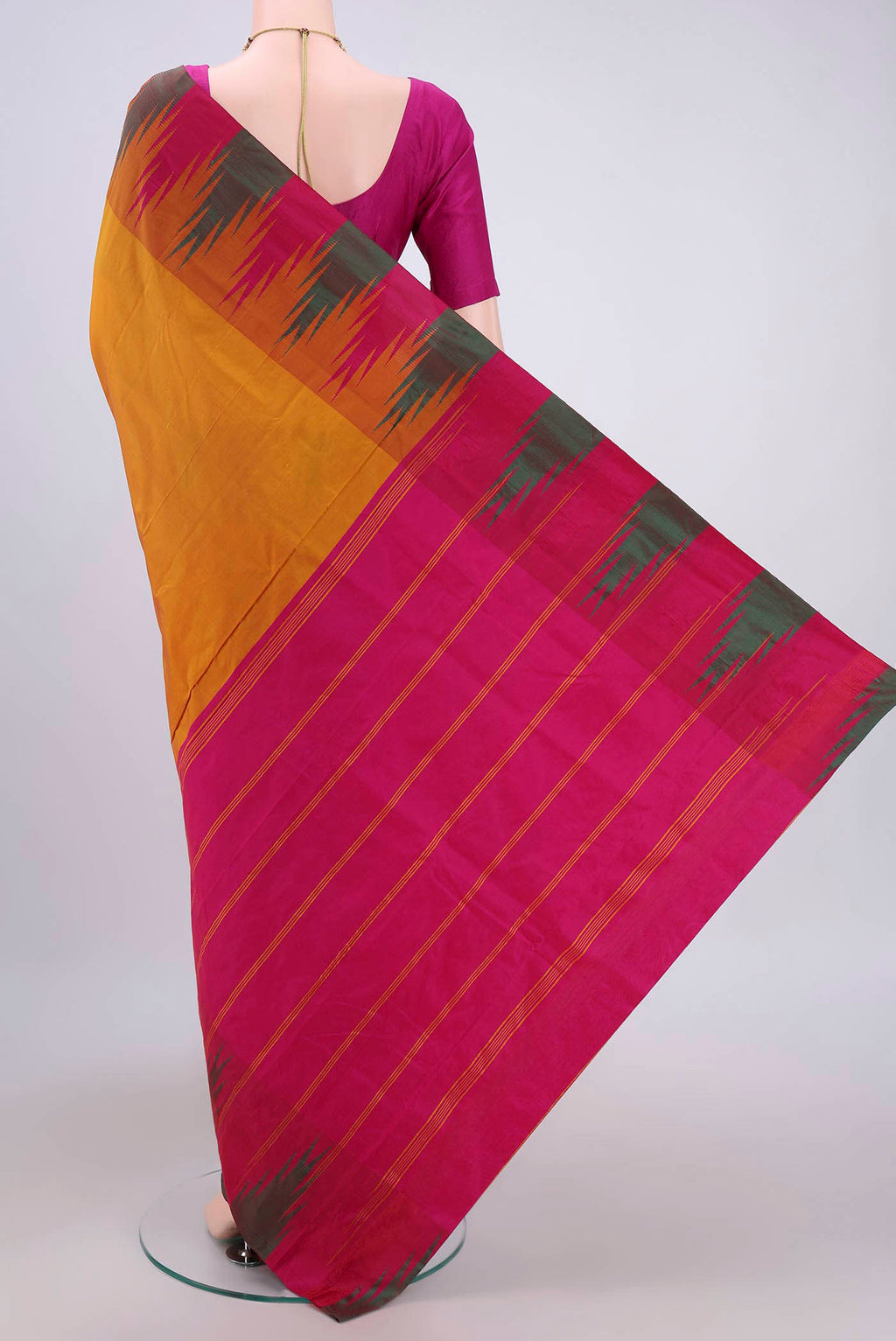 Flat view of Mustard Bangalore Silk Saree with Plain Body and Temple Border. 