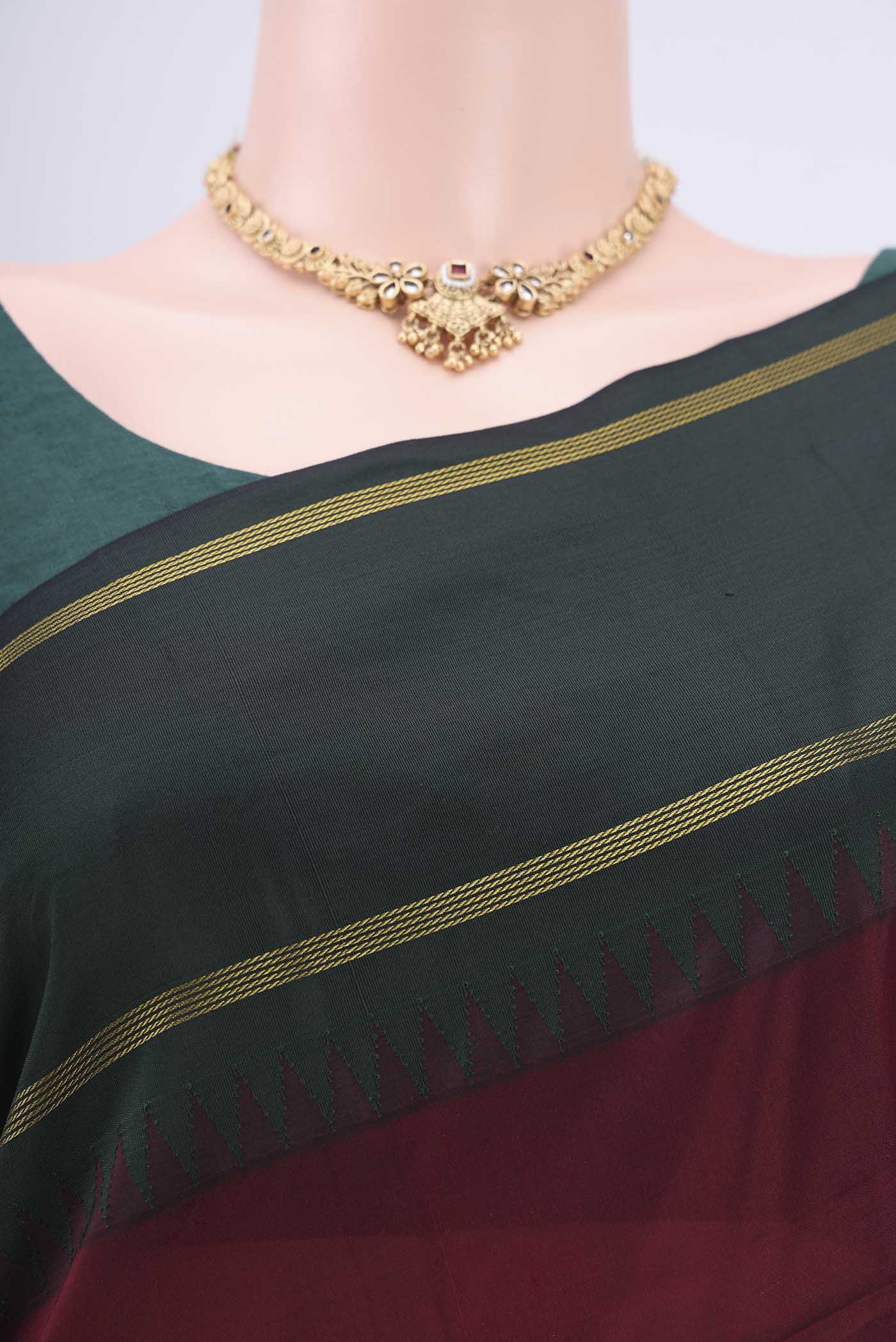 Border image of Maroon Blended Bangalore Silk Saree with Zari Butta on the body and Zari Border. 
