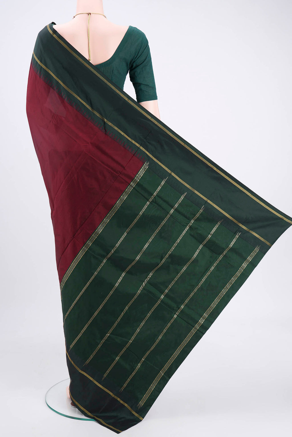 Flat view of Maroon Blended Bangalore Silk Saree with Zari Butta on the body and Zari Border. 