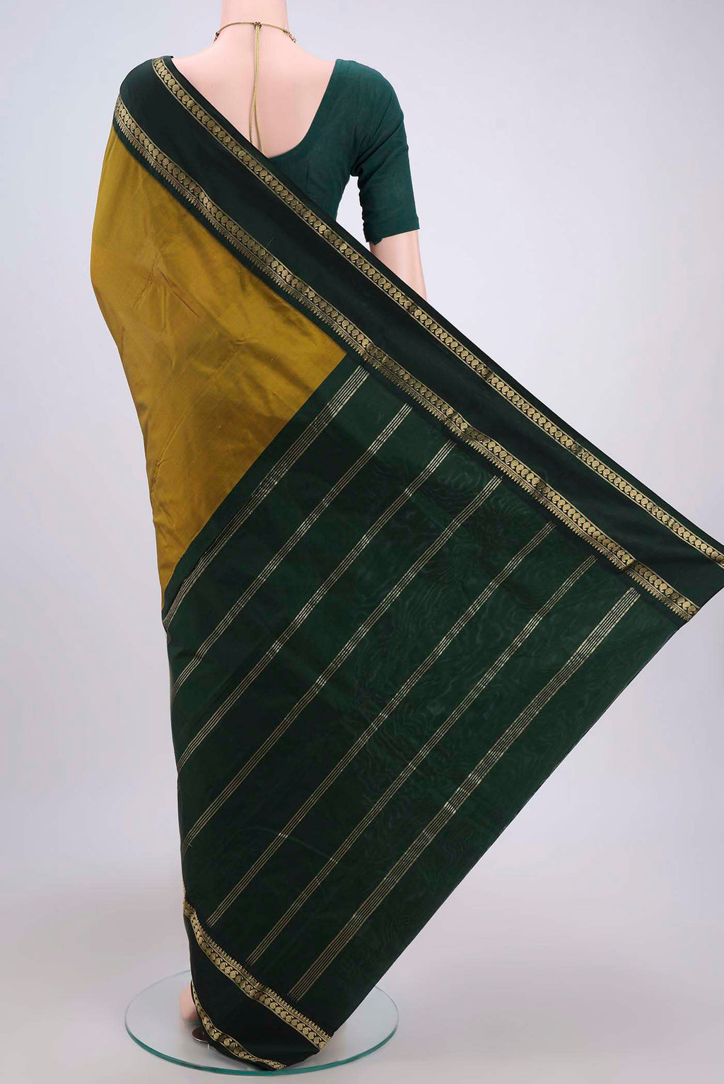 Flat view of Mehandi Green Bangalore Silk Saree with Plain Body and Zari Border. 