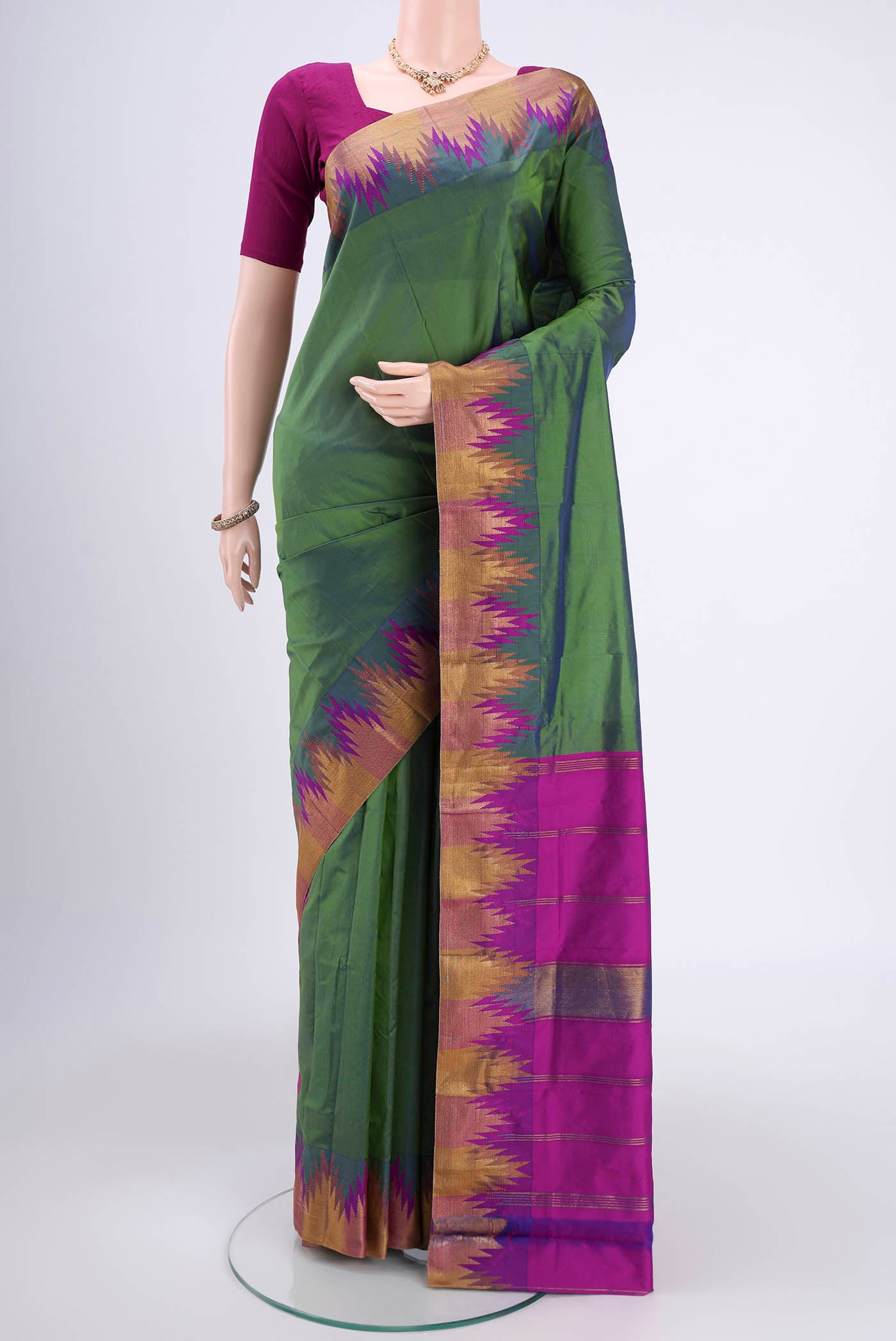 Sage Green Blended Bangalore Silk Saree with Zari Butta on the body and Zari Border.  displayed on a mannequin