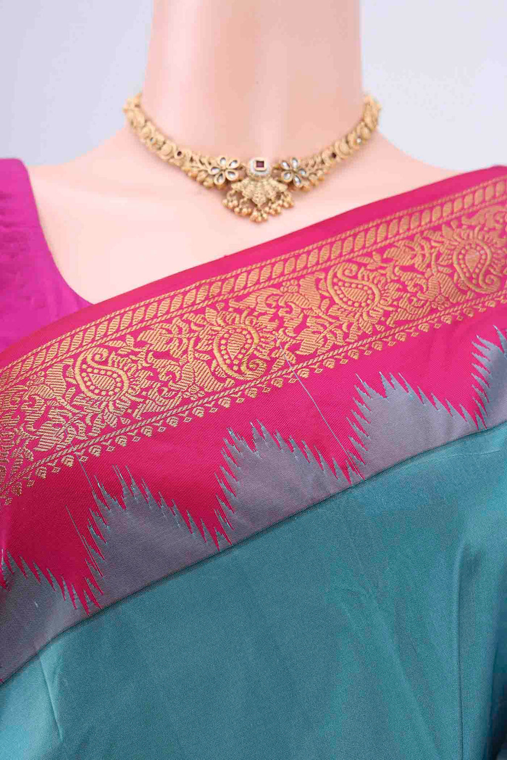 Border image of Blue Bangalore Silk Saree with Zari Butta on the body and Zari Border. 
