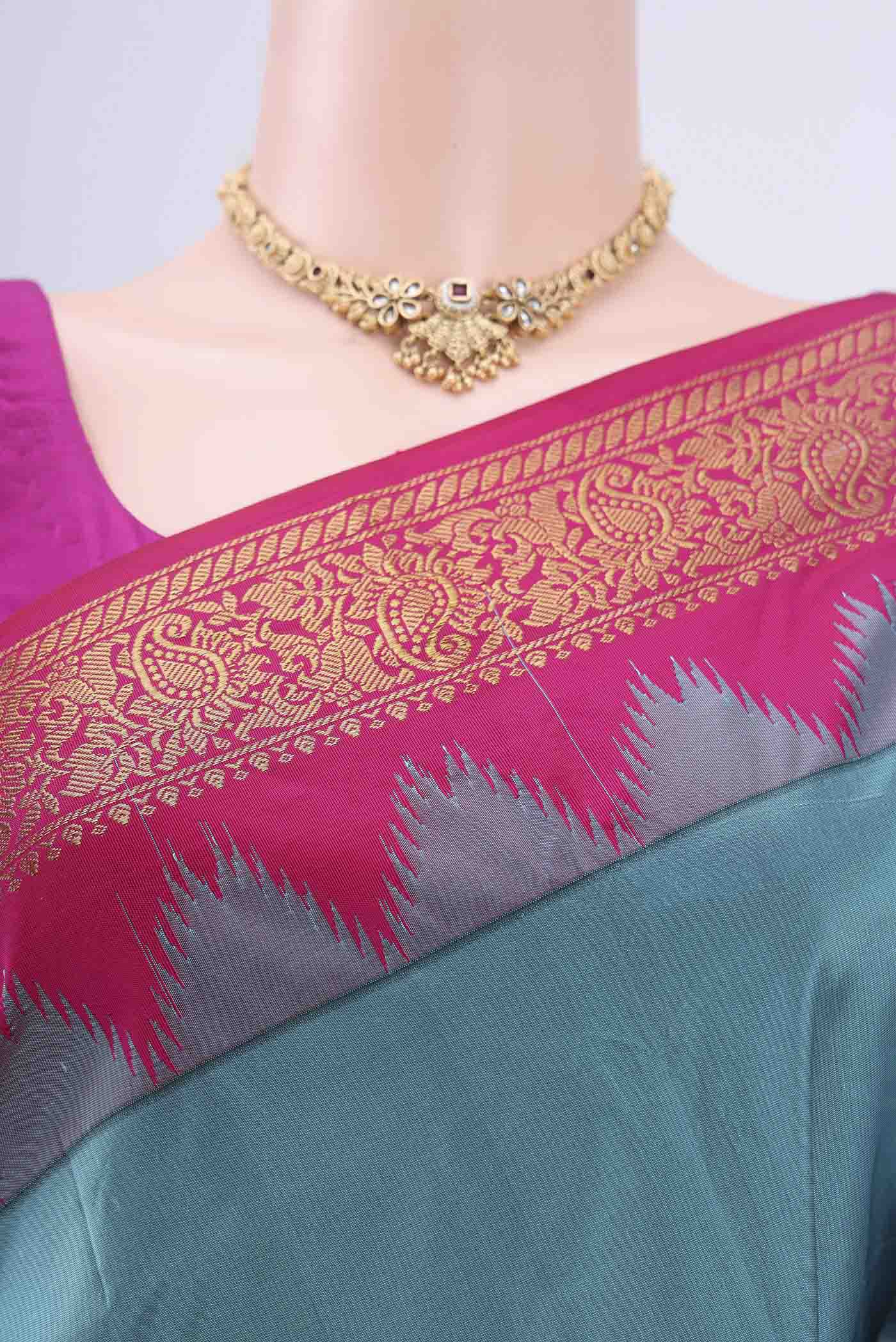 Border image of Blue Bangalore Silk Saree with Zari Butta on the body and Zari Border. 