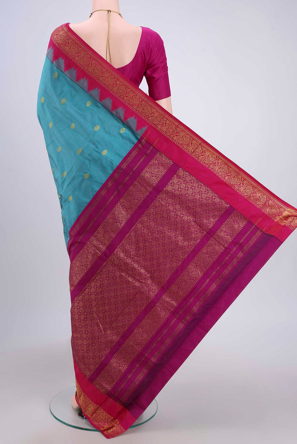 Flat view of Blue Bangalore Silk Saree with Zari Butta on the body and Zari Border. 