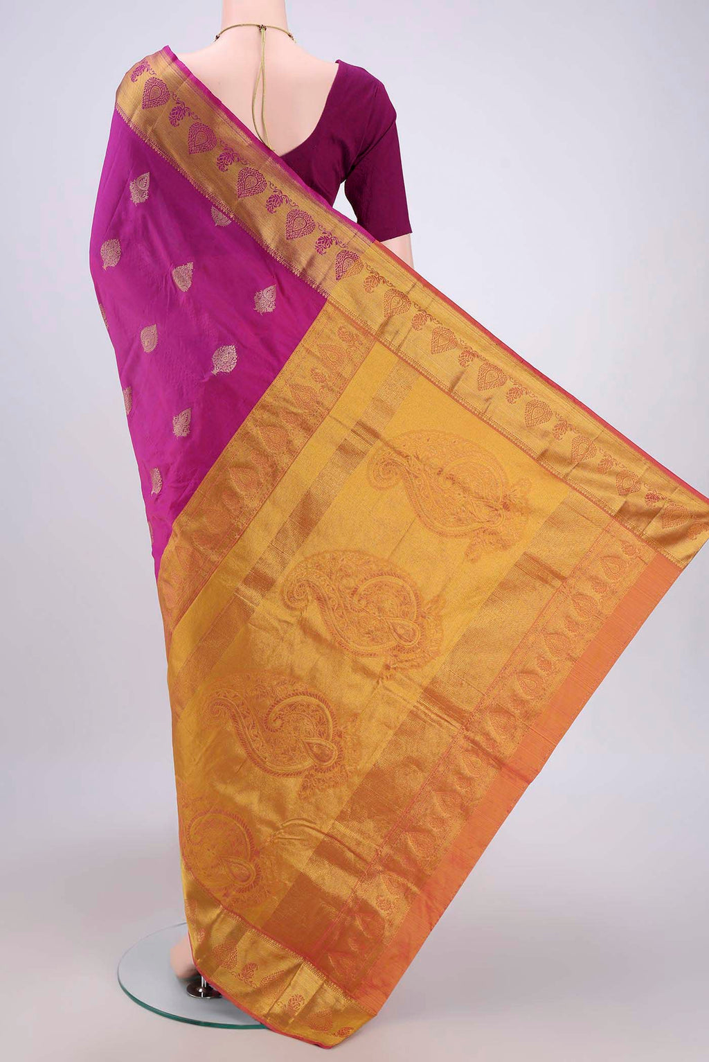 Flat view of Dark Pink Bangalore Silk Saree with Zari Butta on the body and Zari Border. 