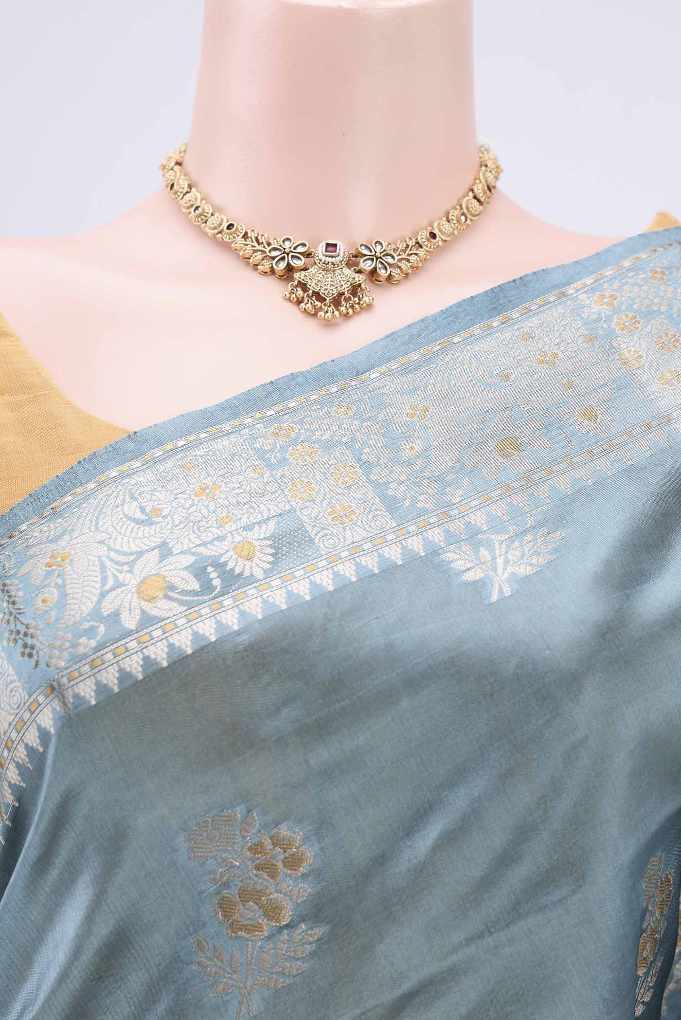 Border image of Blue Grey Banarasi Raw Silk Saree with Zari Butta on the body and Zari Border. 