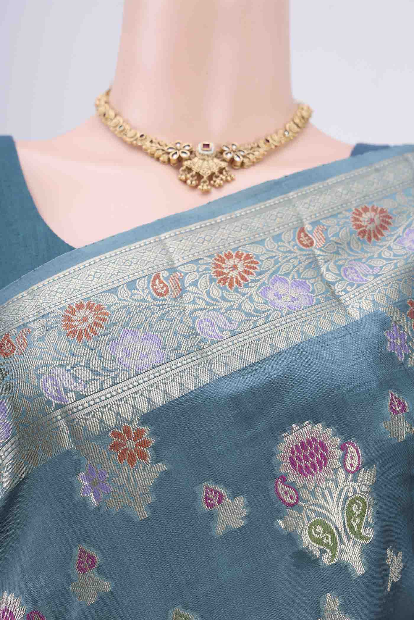 Border image of Blue Grey Banarasi Raw Silk Saree with Zari Butta on the body and Zari Border. 