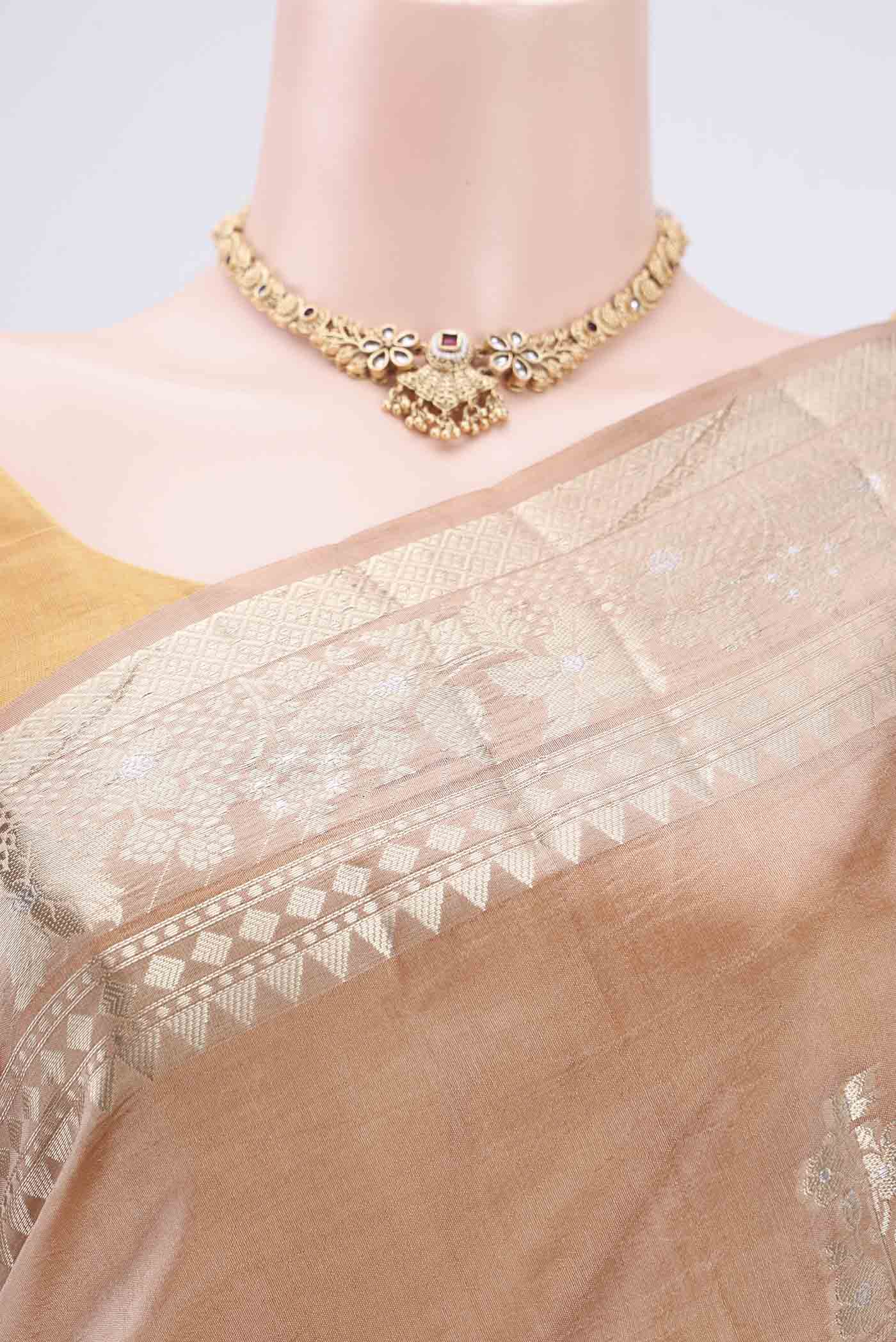 Border image of Dark Beige Banarasi Raw Silk Saree with Zari Butta on the body and Zari Border. 