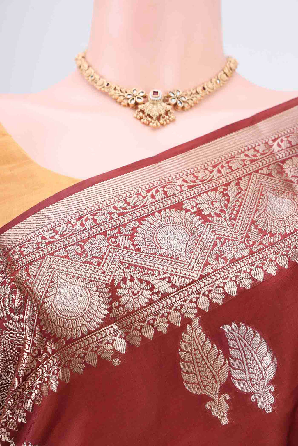 Border image of Brown Banarasi Raw Silk Saree with Zari Butta on the body and Zari Border. 