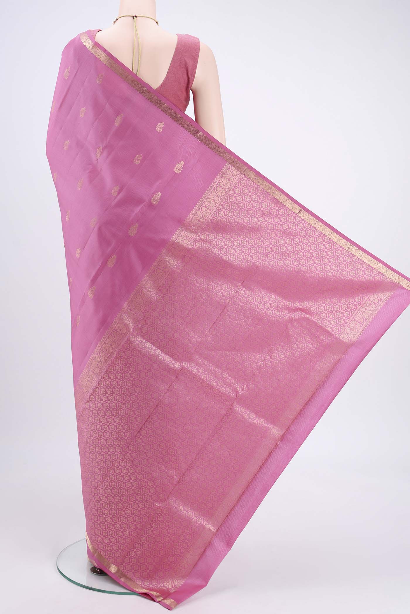 Flat view of Rose pink Kanjivaram Silk Saree with Zari Butta on the body and Zari Border. 