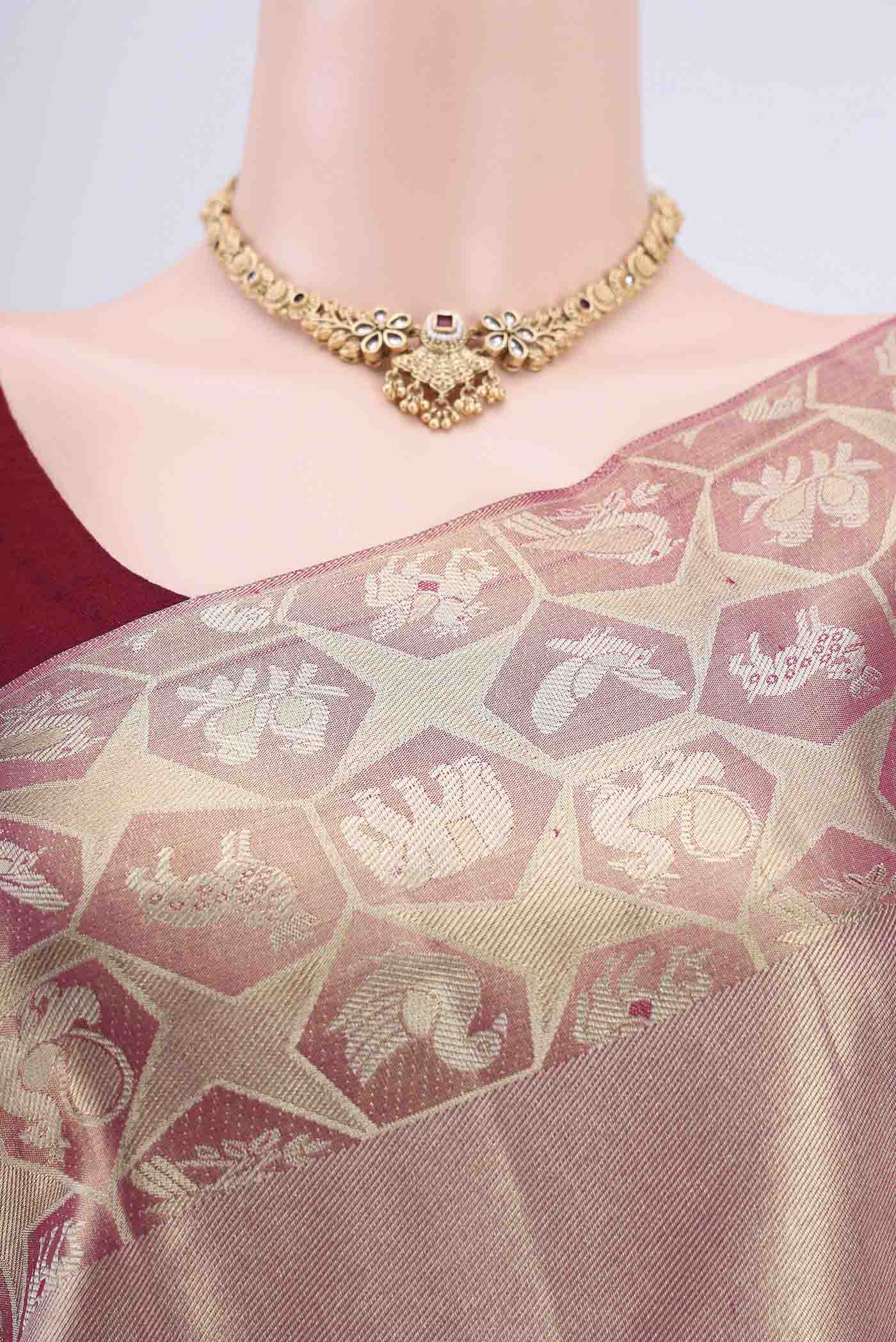 Border image of Gold with Red Dual Tone Kanjivaram Tissue Silk Saree with Zari Brocade on the body and Zari Border. 