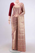 Gold with Red Dual Tone Kanjivaram Tissue Silk Saree with Zari Brocade on the body and Zari Border.  displayed on a mannequin