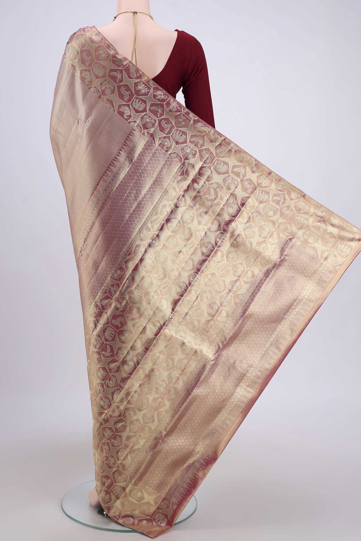 Flat view of Gold with Red Dual Tone Kanjivaram Tissue Silk Saree with Zari Brocade on the body and Zari Border. 