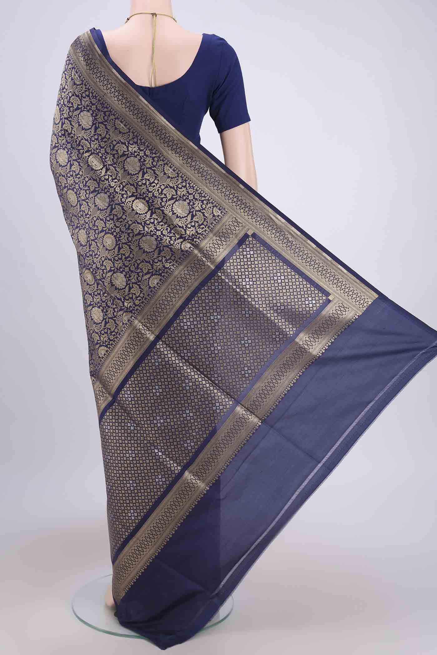 Flat view of Navy Blue Banarasi Jamavar Saree with Zari Brocade on the body and Zari Border. 