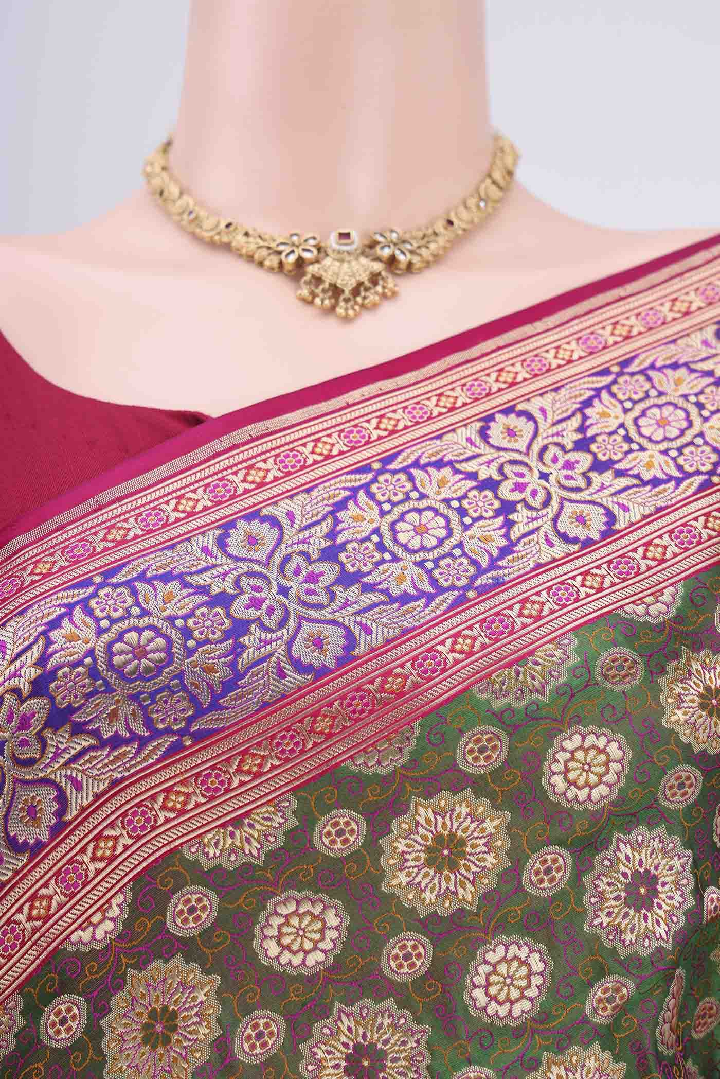 Border image of Green Banarasi Jamavar Saree with Zari Brocade on the body and Zari Border. 