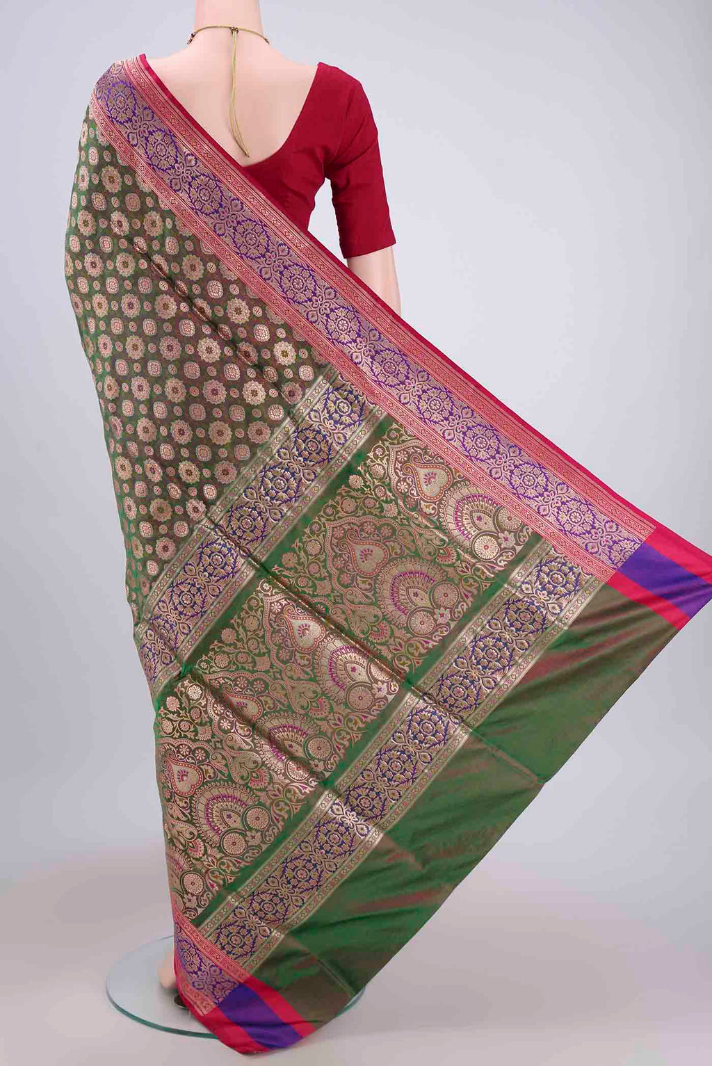 Flat view of Green Banarasi Jamavar Saree with Zari Brocade on the body and Zari Border. 