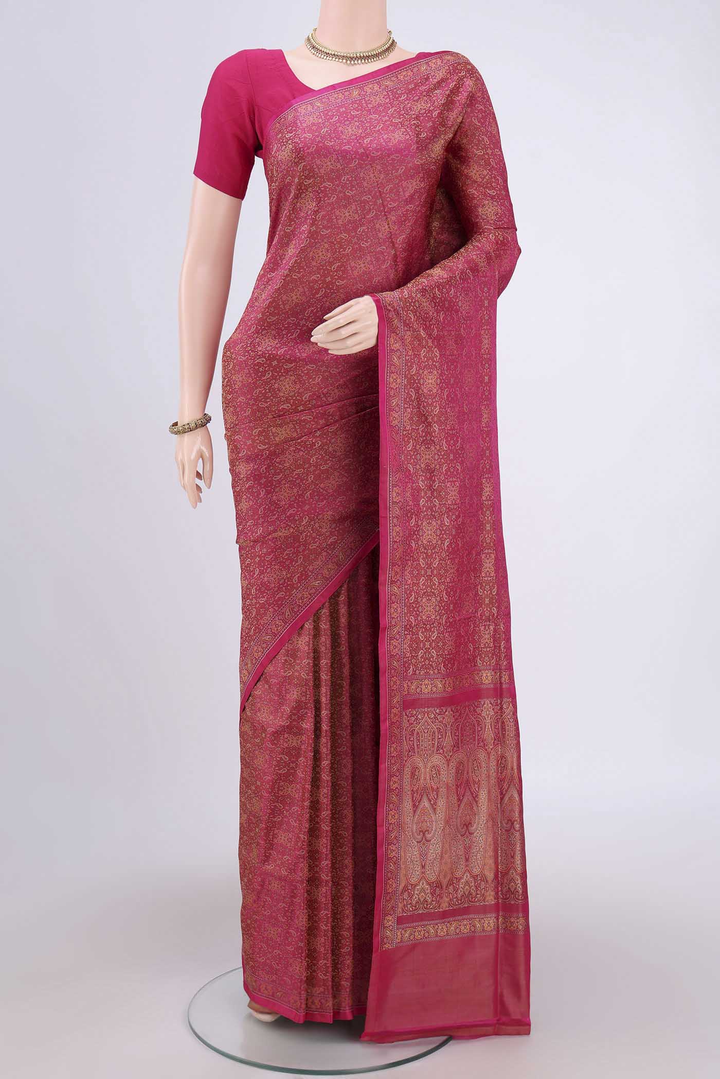 Rani Pink Banarasi Tanchoi Silk Saree with Thread Brocade on the body and Thread Border.  displayed on a mannequin