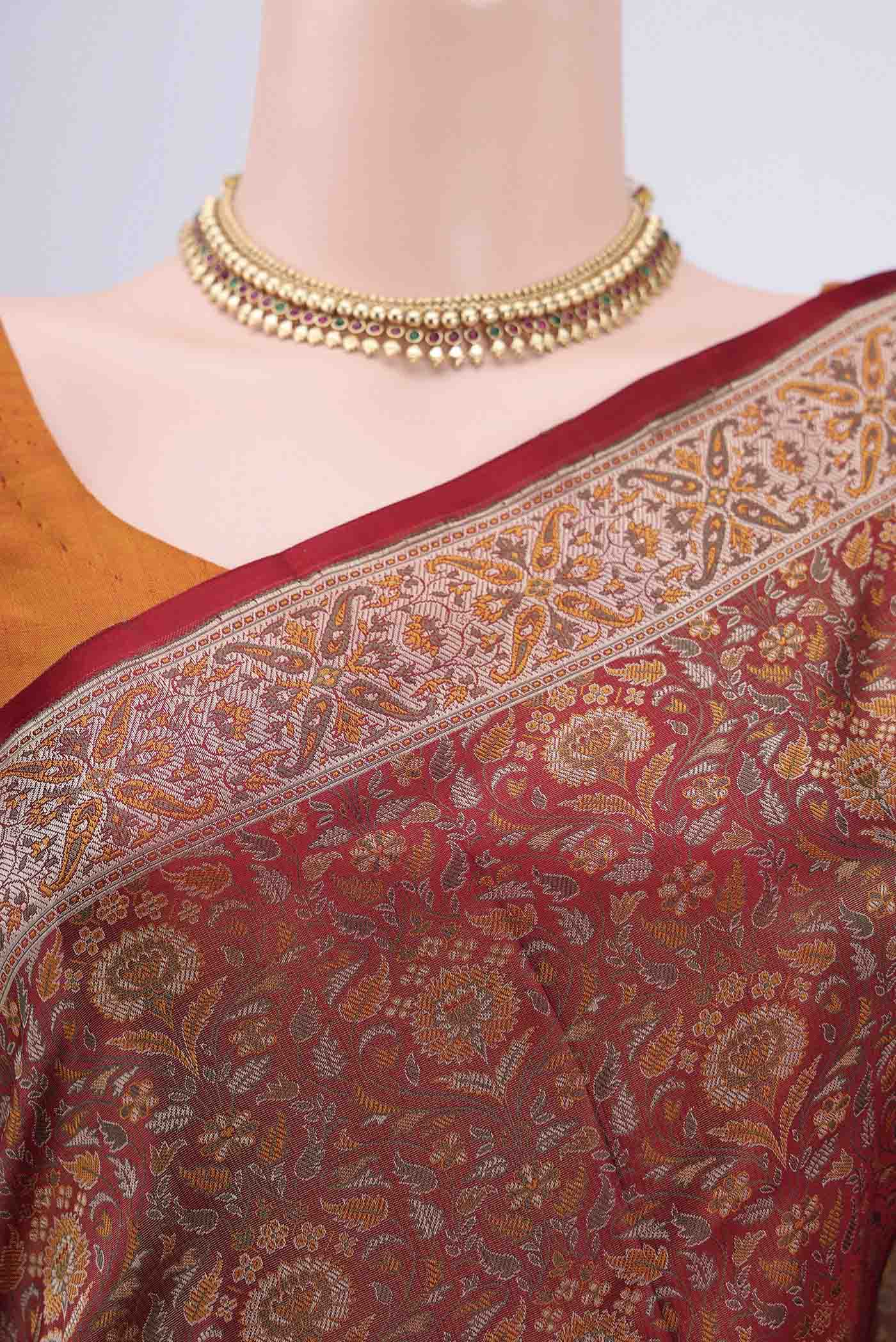 Border image of Maroon Banarasi Tanchoi Silk Saree with Thread Brocade on the body and Thread Border. 