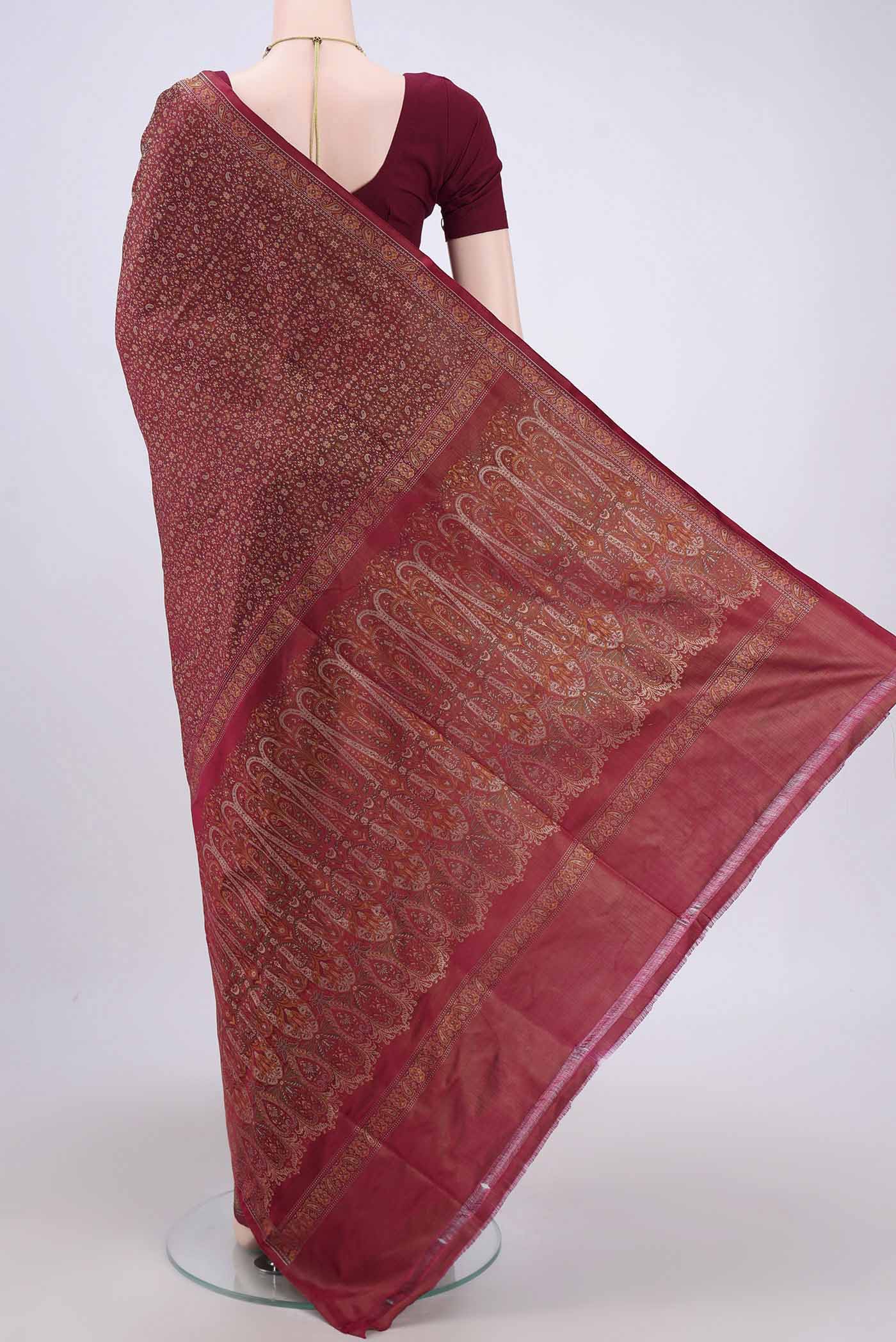 Flat view of Maroon Banarasi Tanchoi Silk Saree with Thread Brocade on the body and Thread Border. 