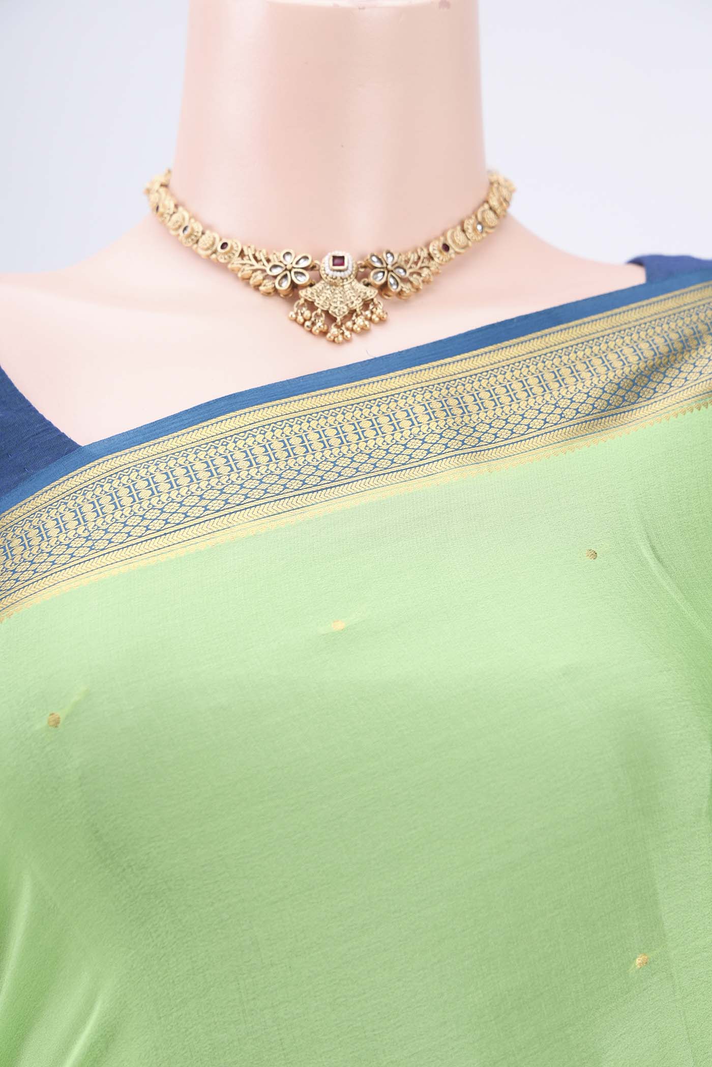 Border image of Parrot Green Mysore Crepe Saree with Plain Body and Zari Border. 