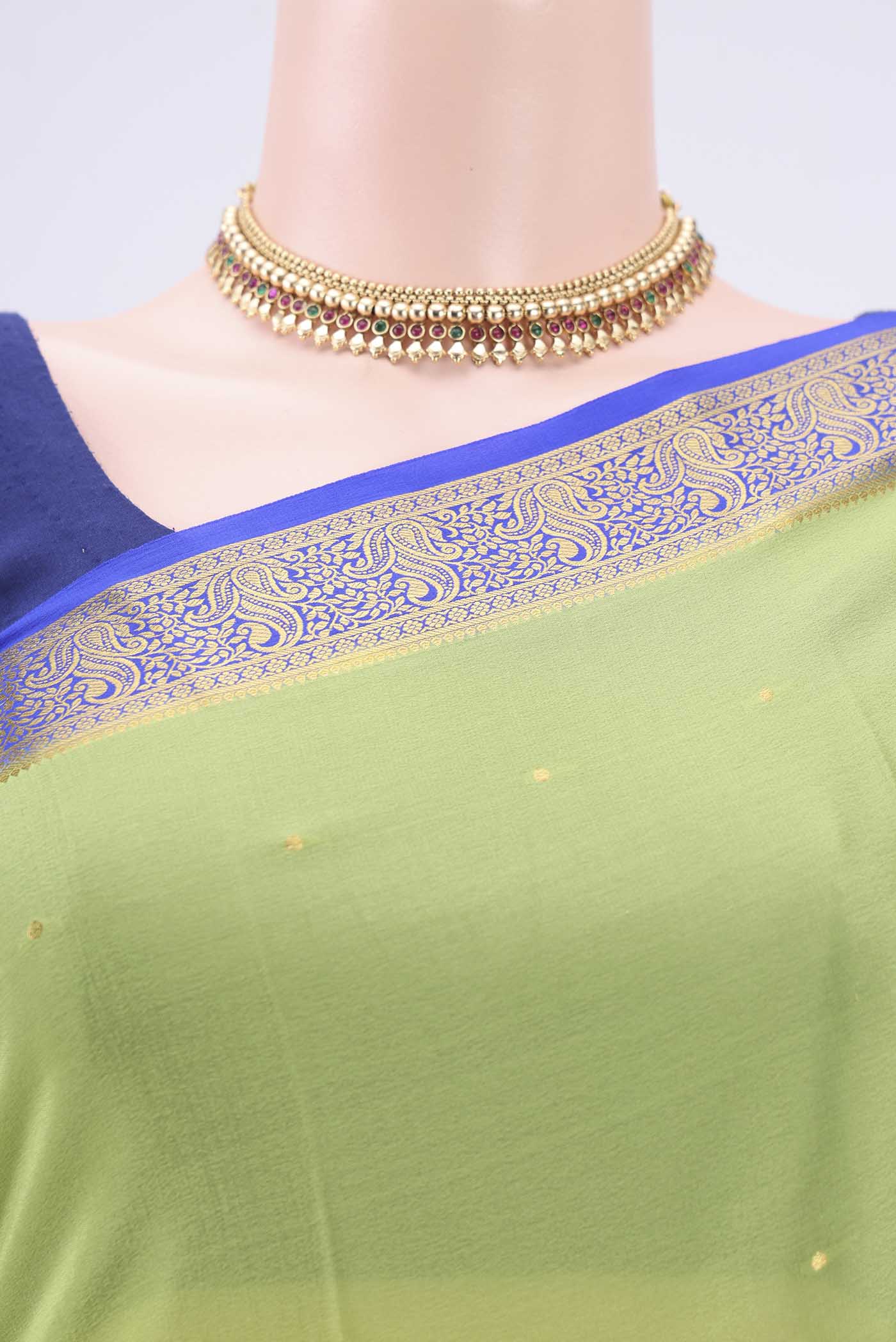 Border image of Green Mysore Crepe Saree with Plain Body and Zari Border. 