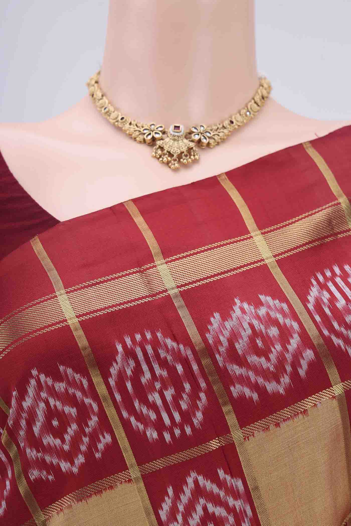 Border image of Dark Beige Pochampally Silk Saree with Checked design on the body and Zari Border. 
