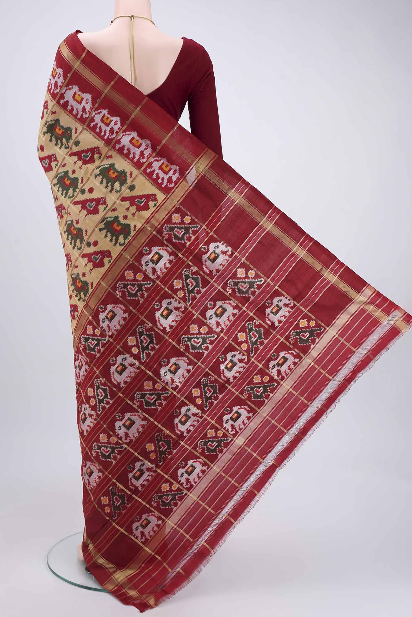 Flat view of Dark Beige Pochampally Silk Saree with Checked design on the body and Zari Border. 