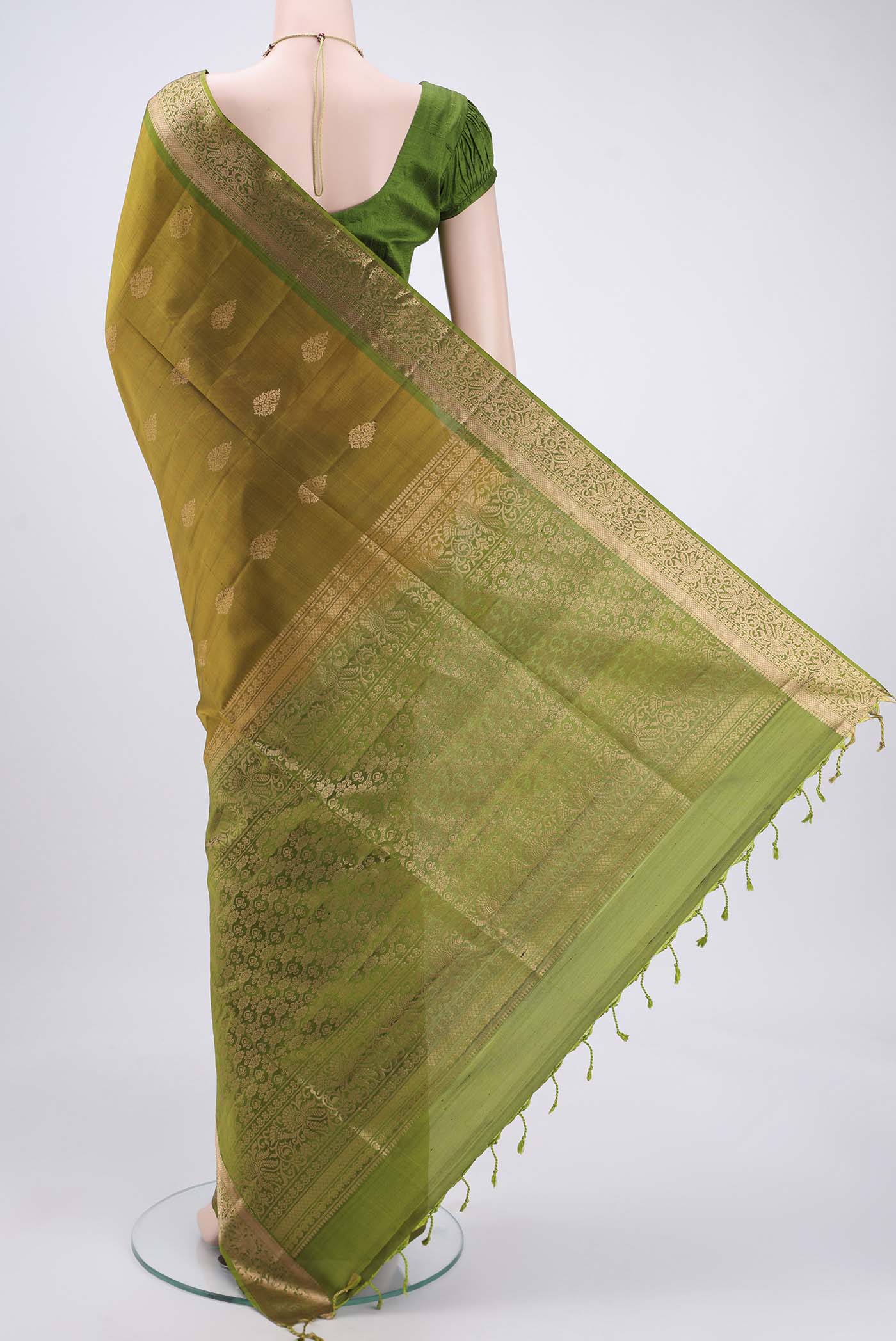 Flat view of Mehandi Green Bangalore Silk Saree with Zari Butta on the body and Zari Border. 