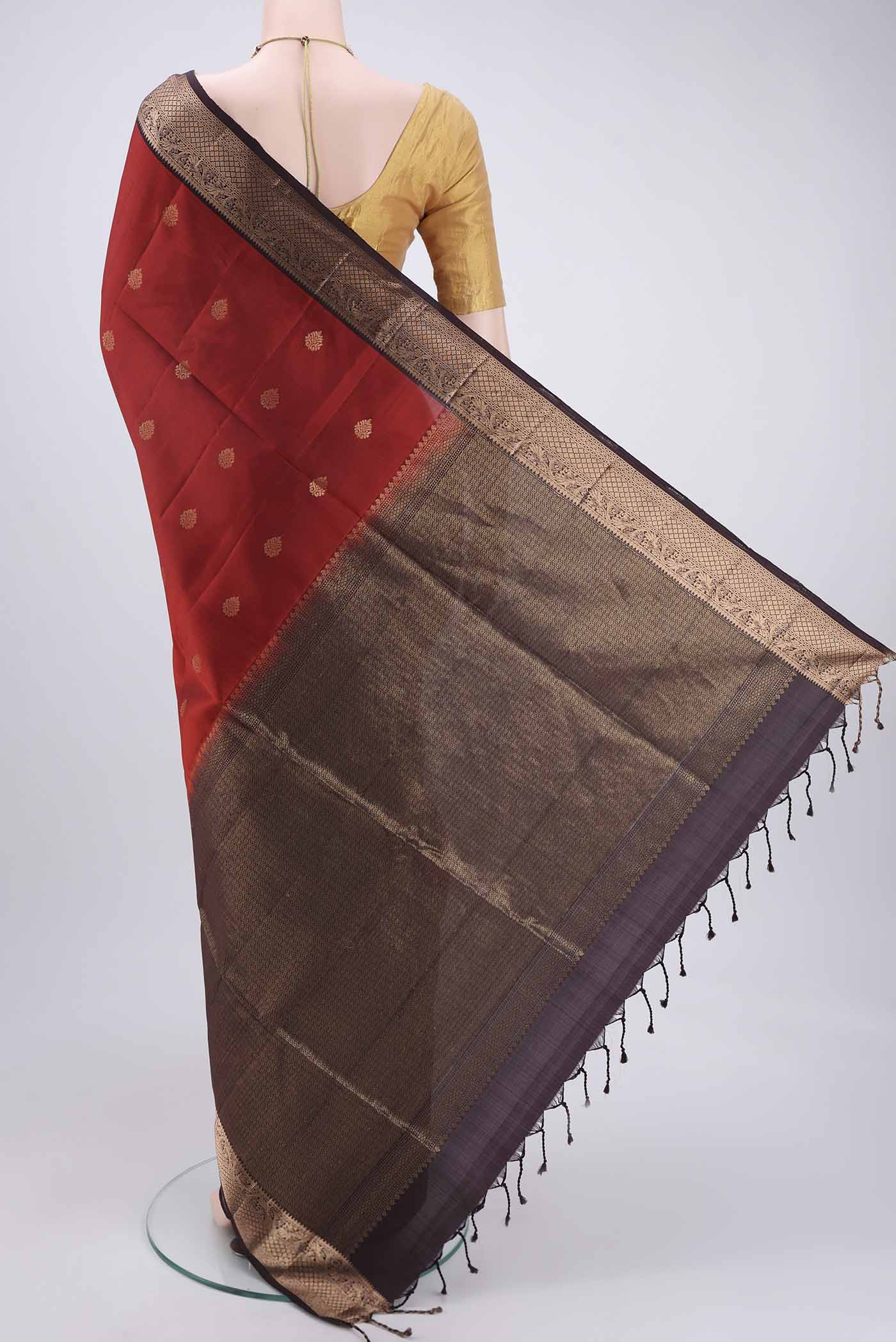 Flat view of Brick Orange Bangalore Silk Saree with Zari Butta on the body and Zari Border. 