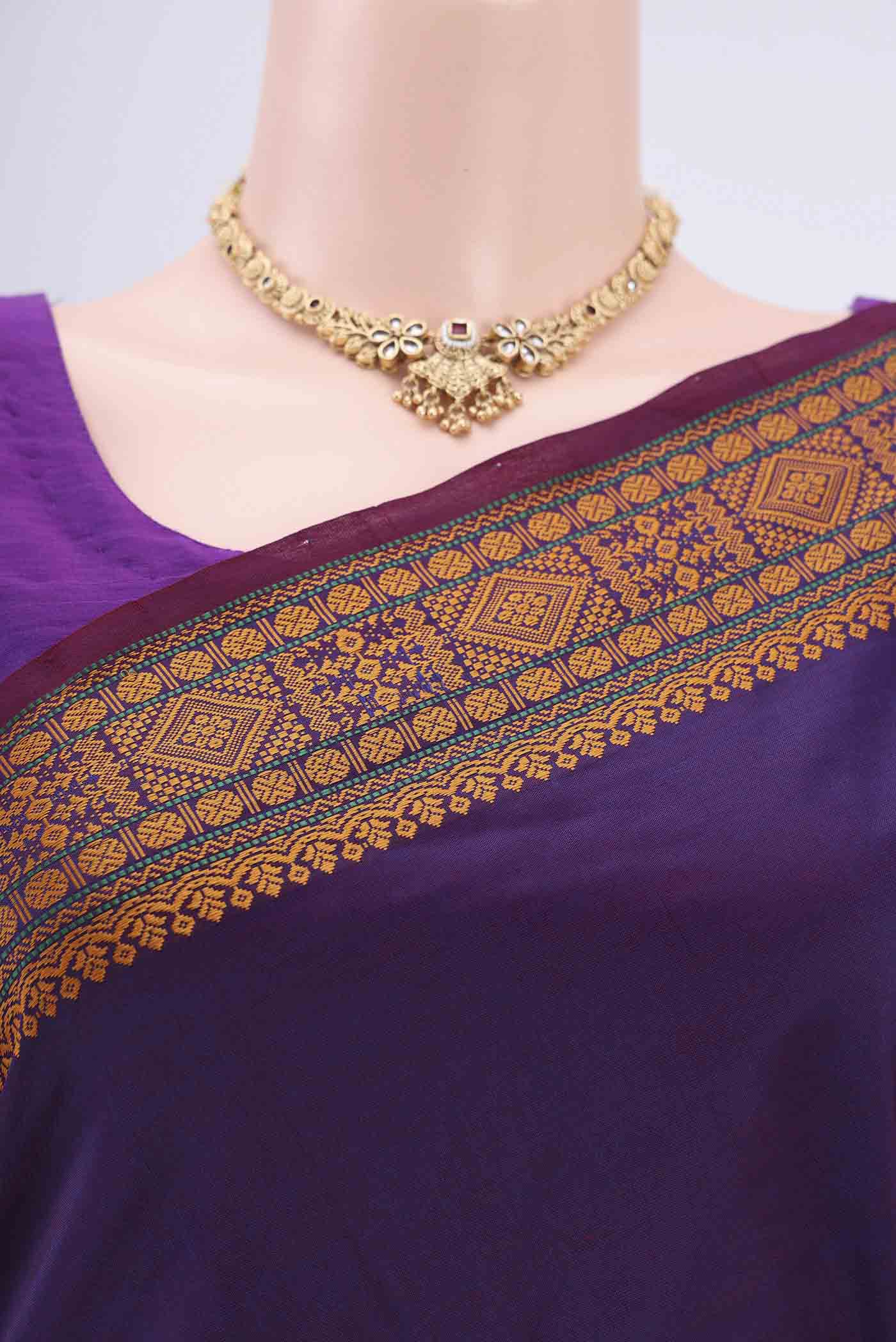 Border image of Purple Blended Poly Cotton Saree with Thread Butta on the body and Thread Border. 
