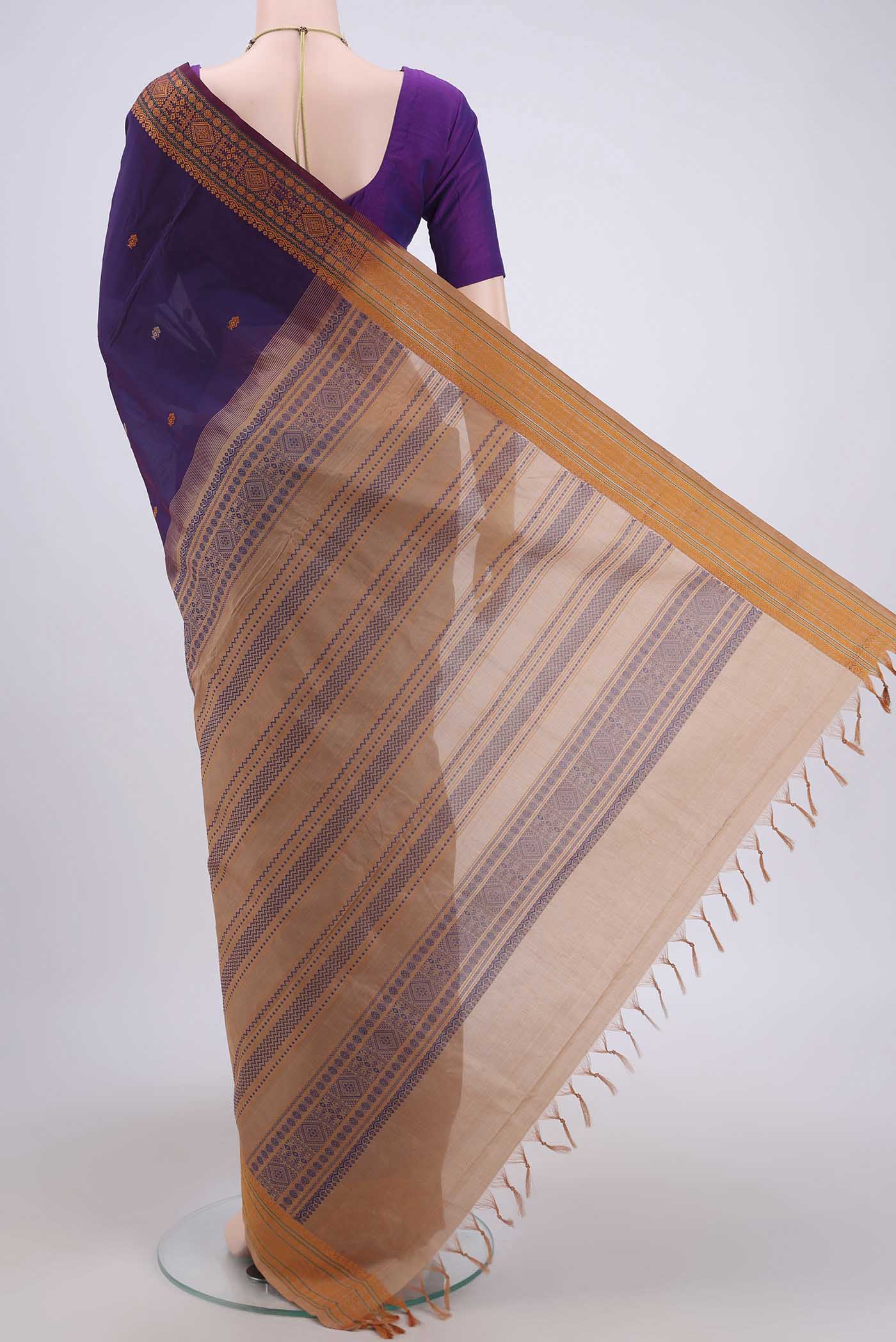 Flat view of Purple Blended Poly Cotton Saree with Thread Butta on the body and Thread Border. 