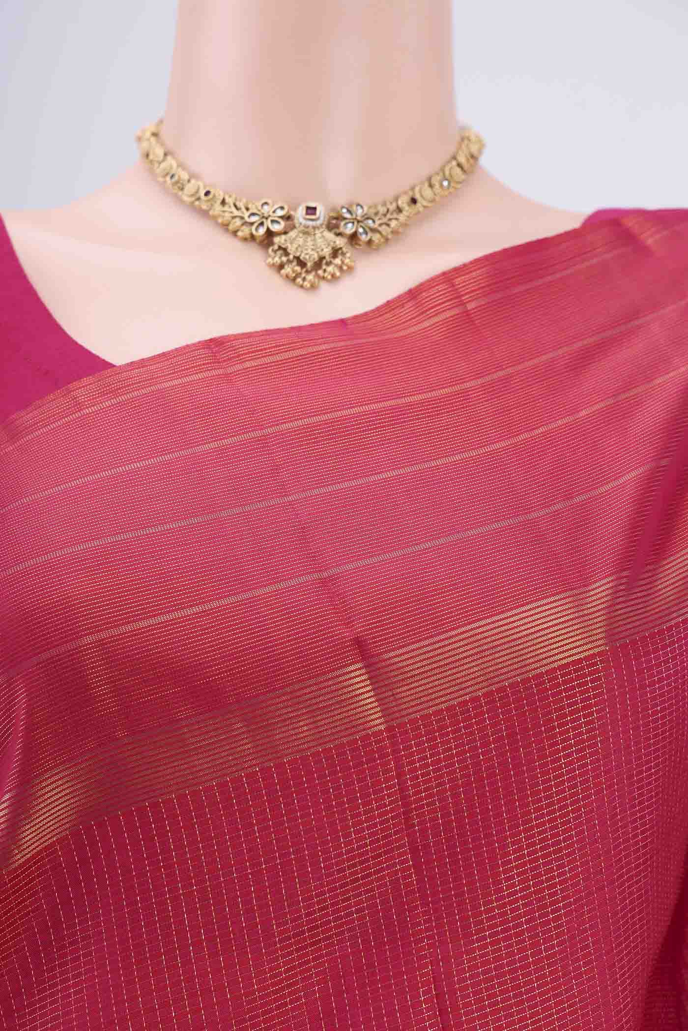 Border image of Dark Pink Dual Tone Kanchipuram Silk Saree with Checked design on the body and Zari Border. 