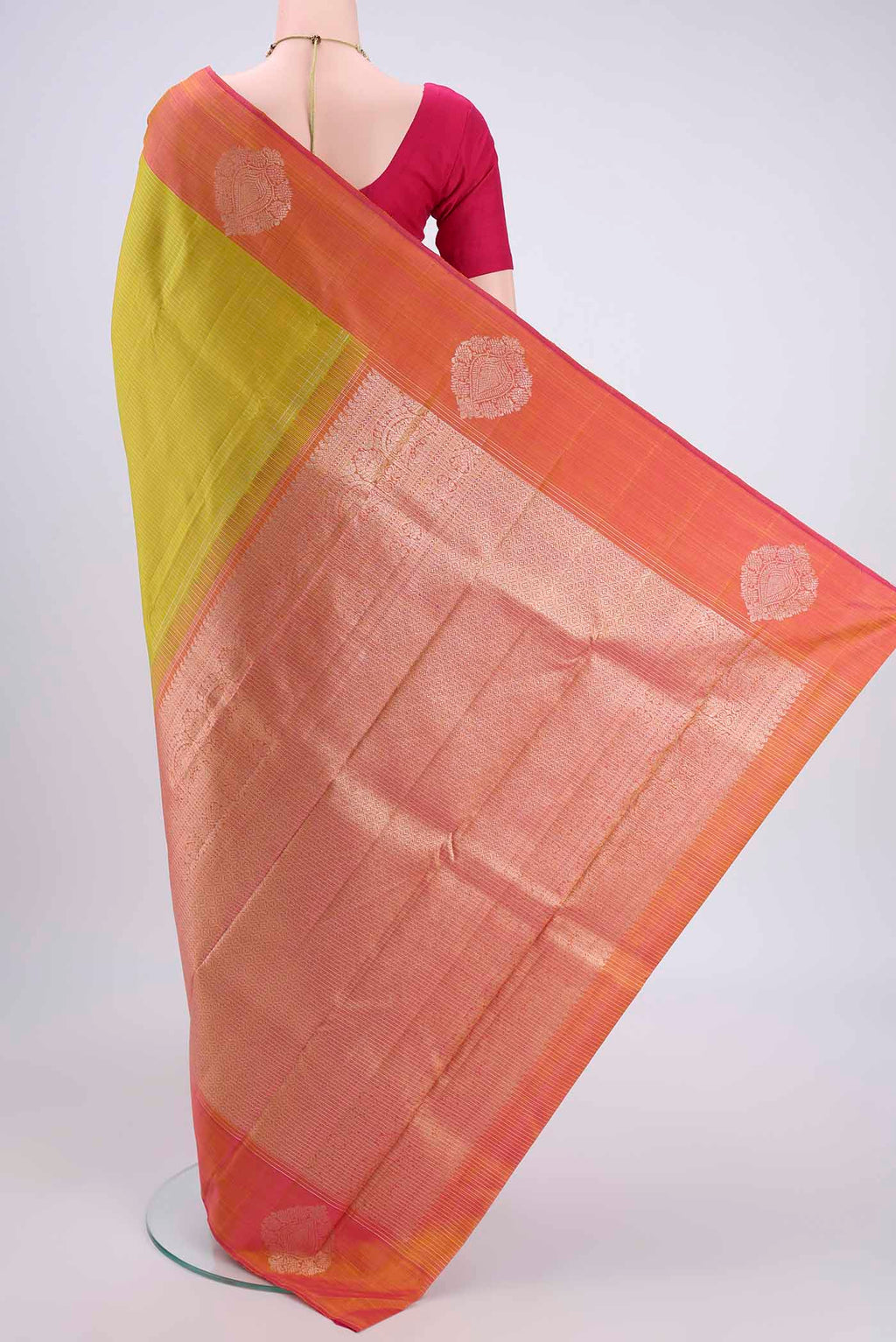 Flat view of Acid Green Kanjivaram Silk Saree with Checked design on the body and Zari Border. 